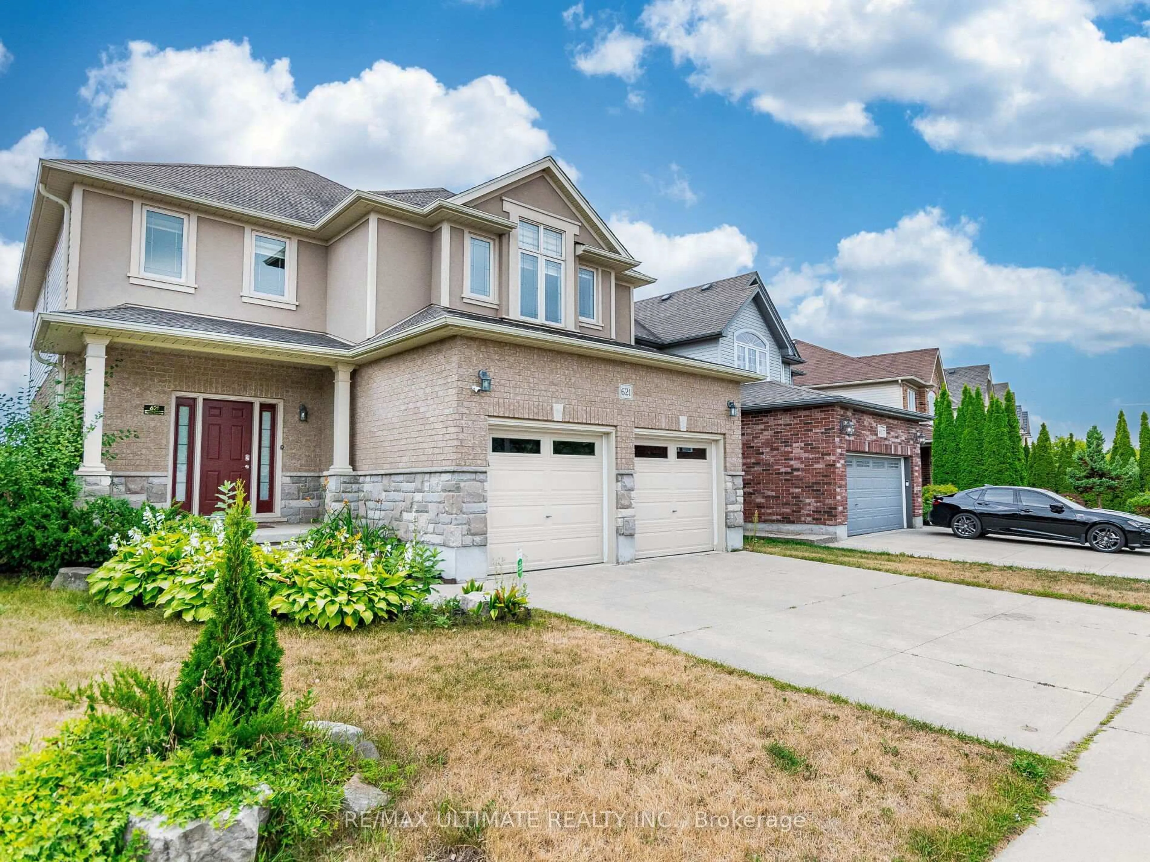 Home with brick exterior material, street for 621 Thomas Slee Dr, Kitchener Ontario N2P 2Y8