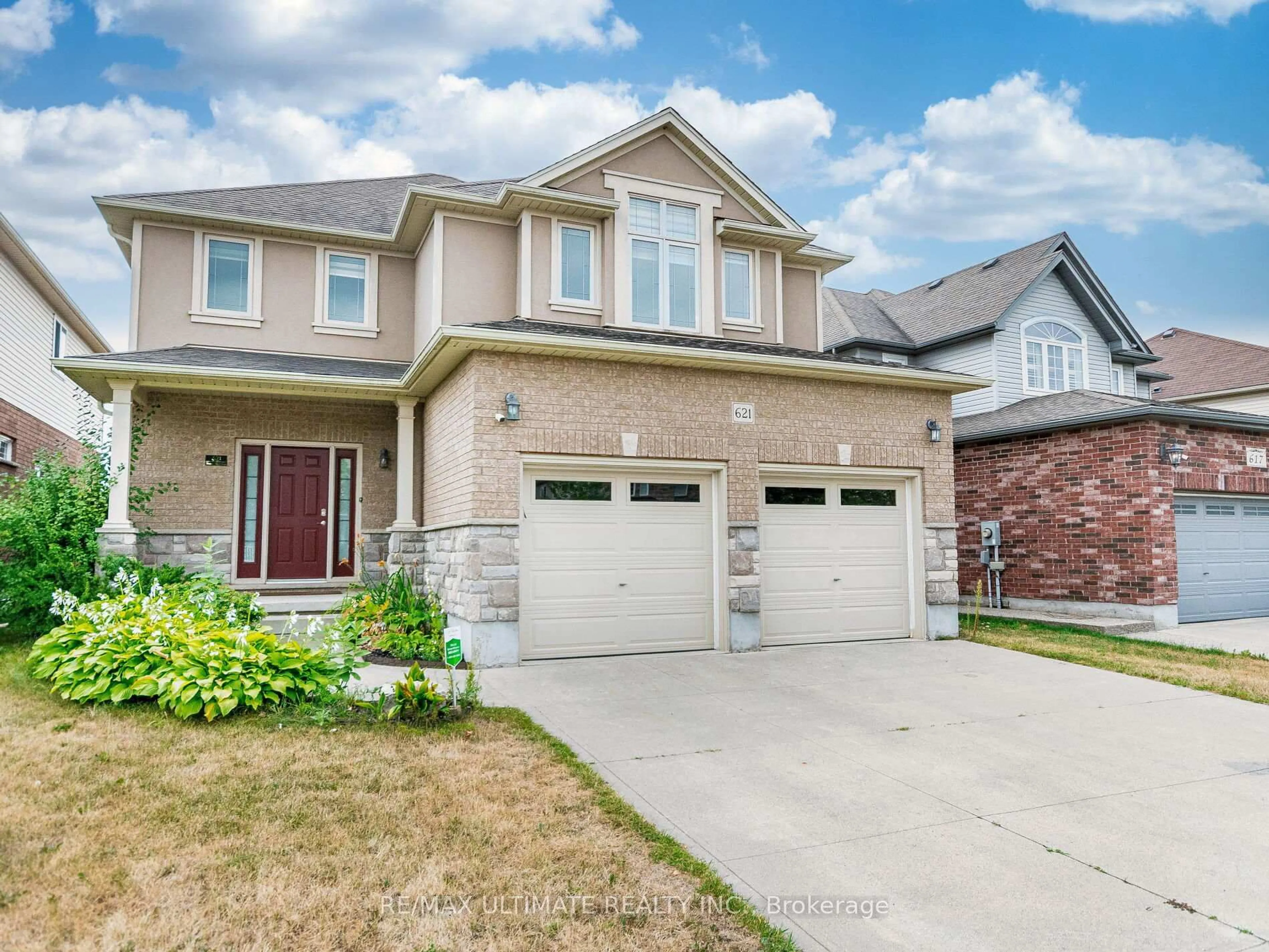 Home with brick exterior material, street for 621 Thomas Slee Dr, Kitchener Ontario N2P 2Y8
