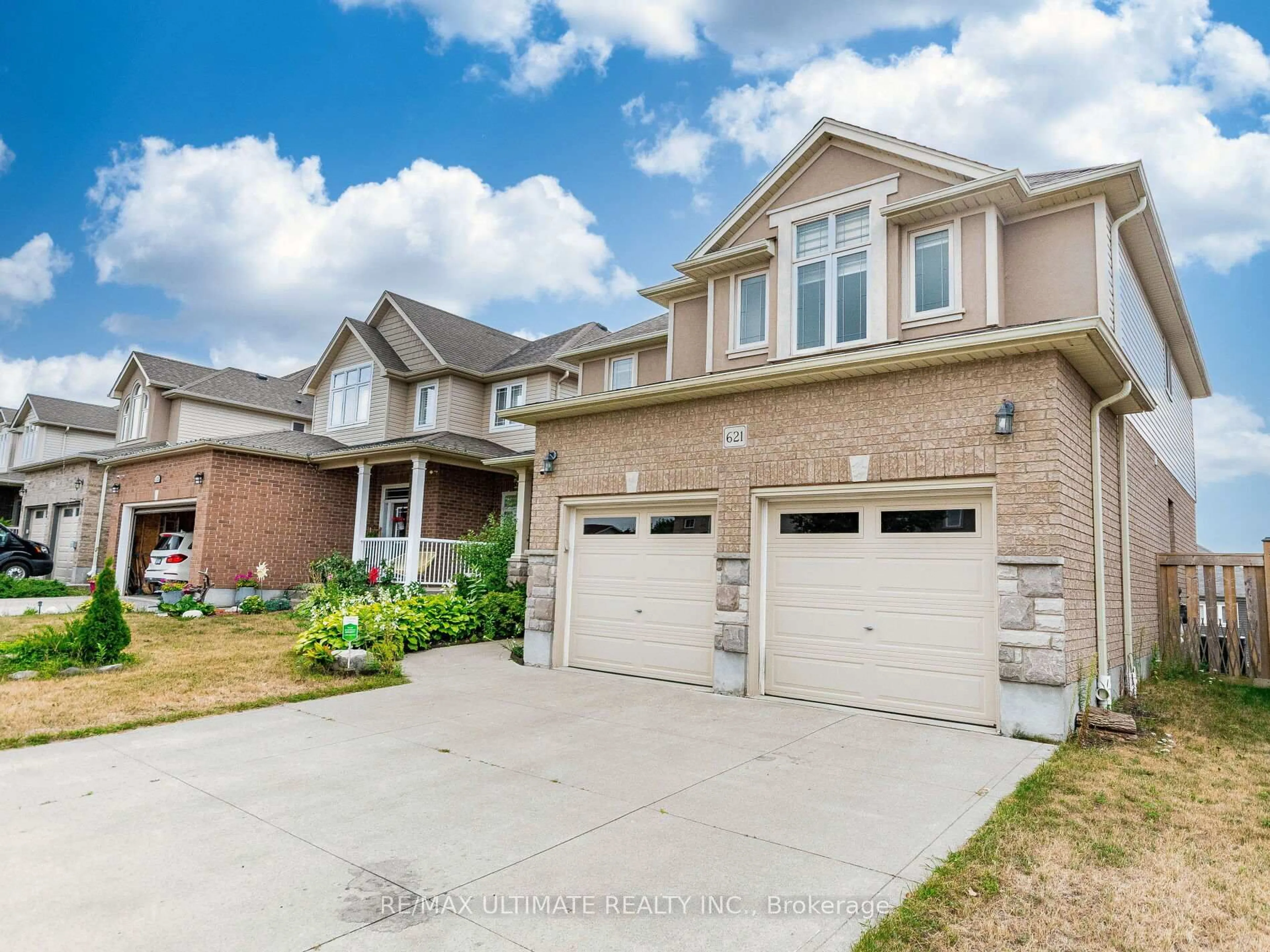 Home with brick exterior material, street for 621 Thomas Slee Dr, Kitchener Ontario N2P 2Y8