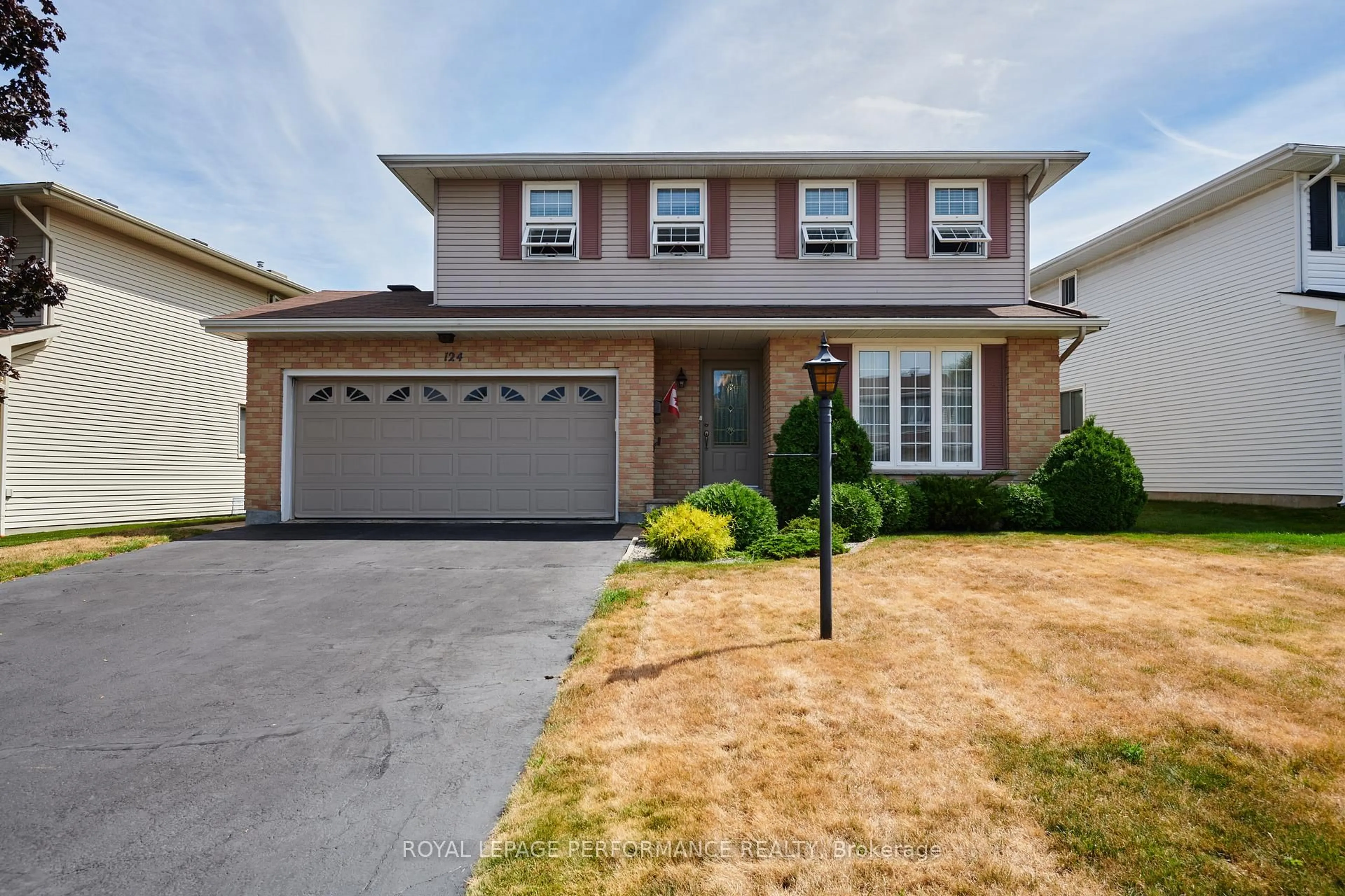 Home with brick exterior material, street for 124 Medhurst Dr, Ottawa Ontario K2G 4L6
