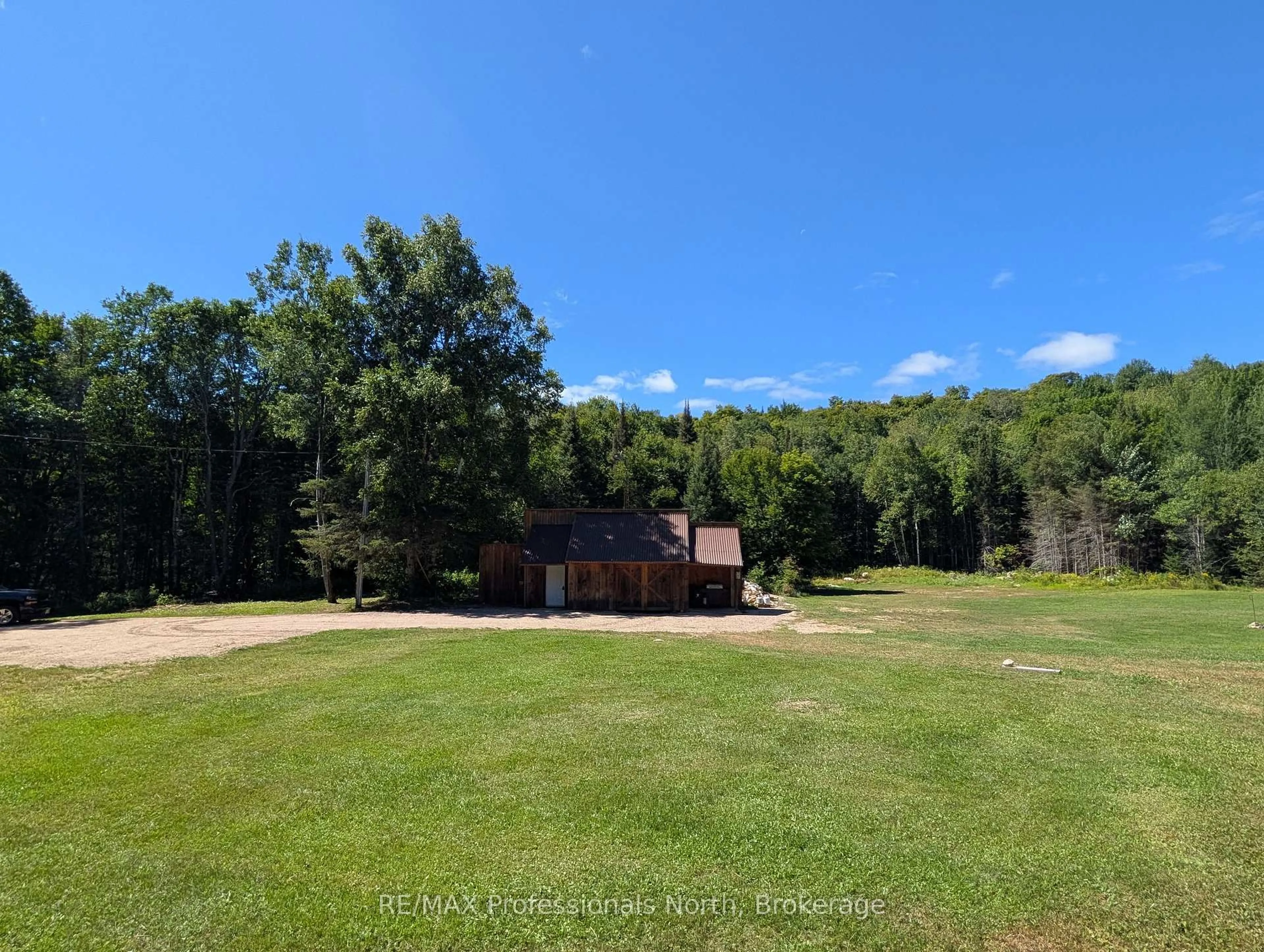 A pic from outside/outdoor area/front of a property/back of a property/a pic from drone, unknown for 376 Riding Ranch Rd, South River Ontario P0A 1X0