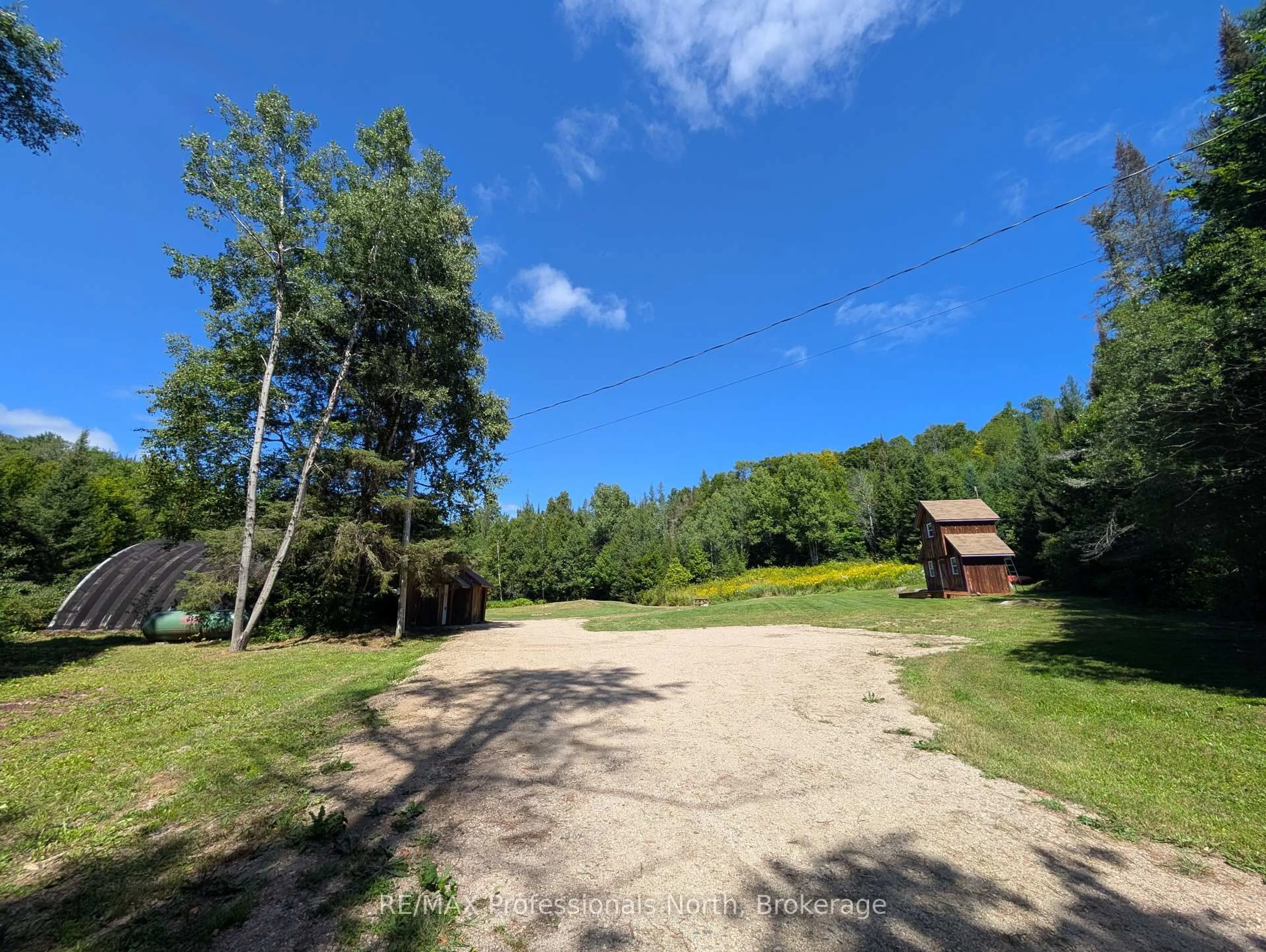 A pic from outside/outdoor area/front of a property/back of a property/a pic from drone, forest/trees view for 376 Riding Ranch Rd, South River Ontario P0A 1X0