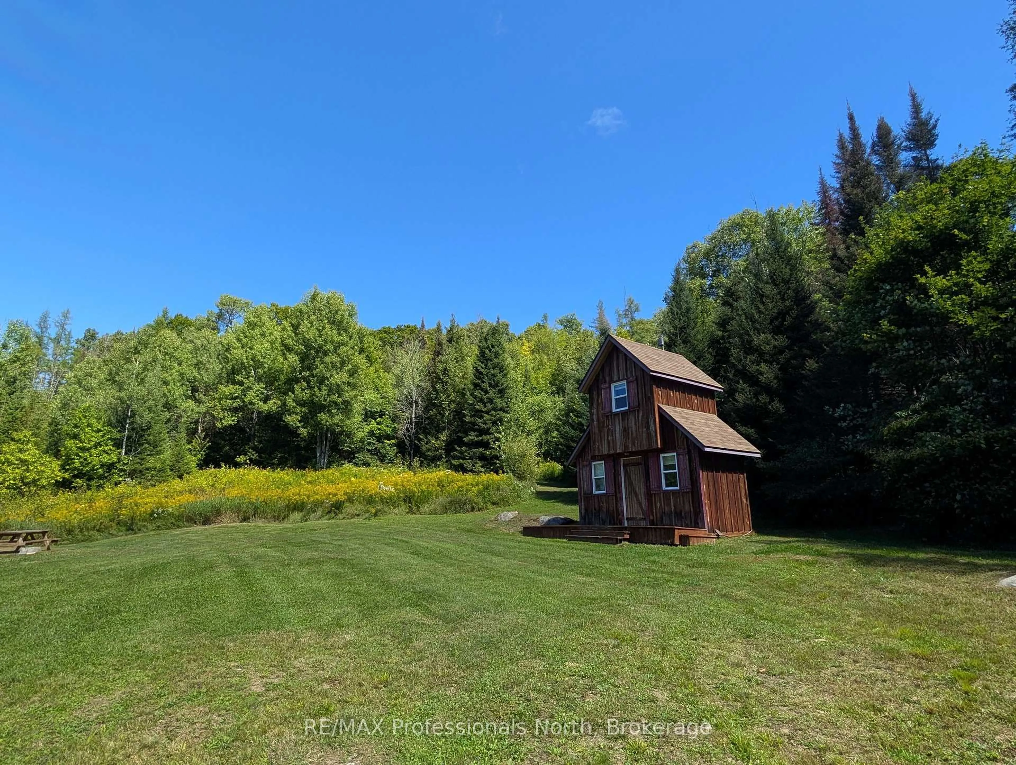 A pic from outside/outdoor area/front of a property/back of a property/a pic from drone, forest/trees view for 376 Riding Ranch Rd, South River Ontario P0A 1X0