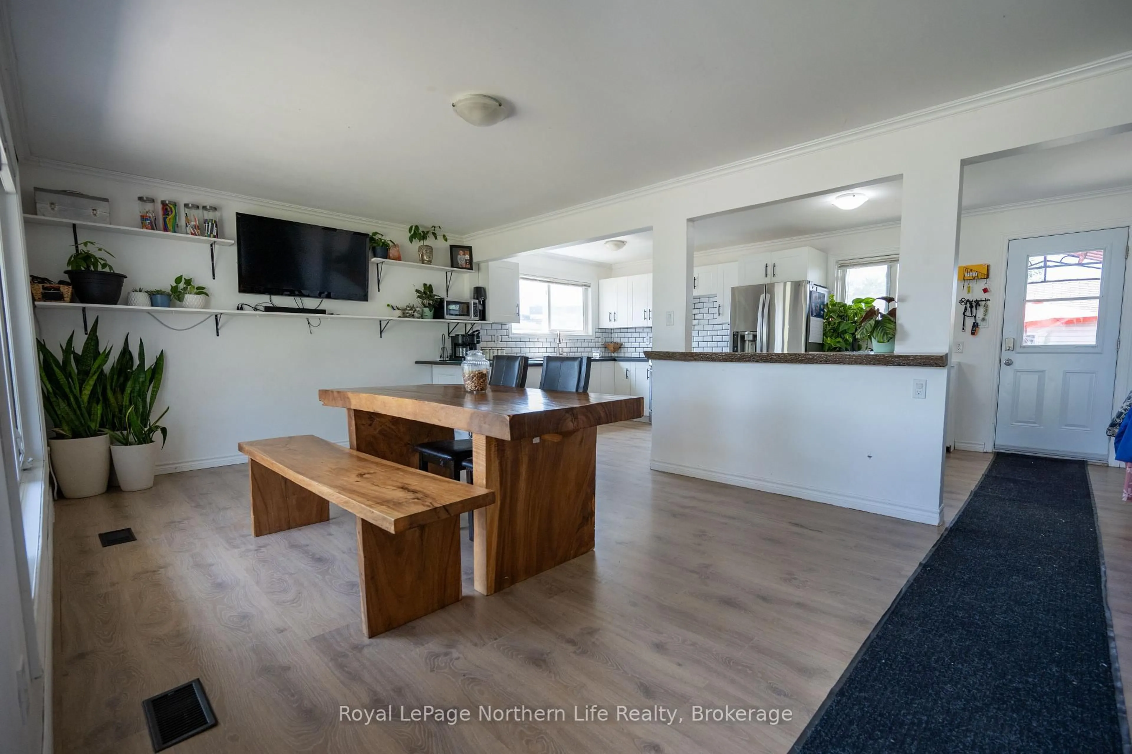 Open concept kitchen, wood/laminate floor for 507 Brennan St, North Bay Ontario P1B 6J9