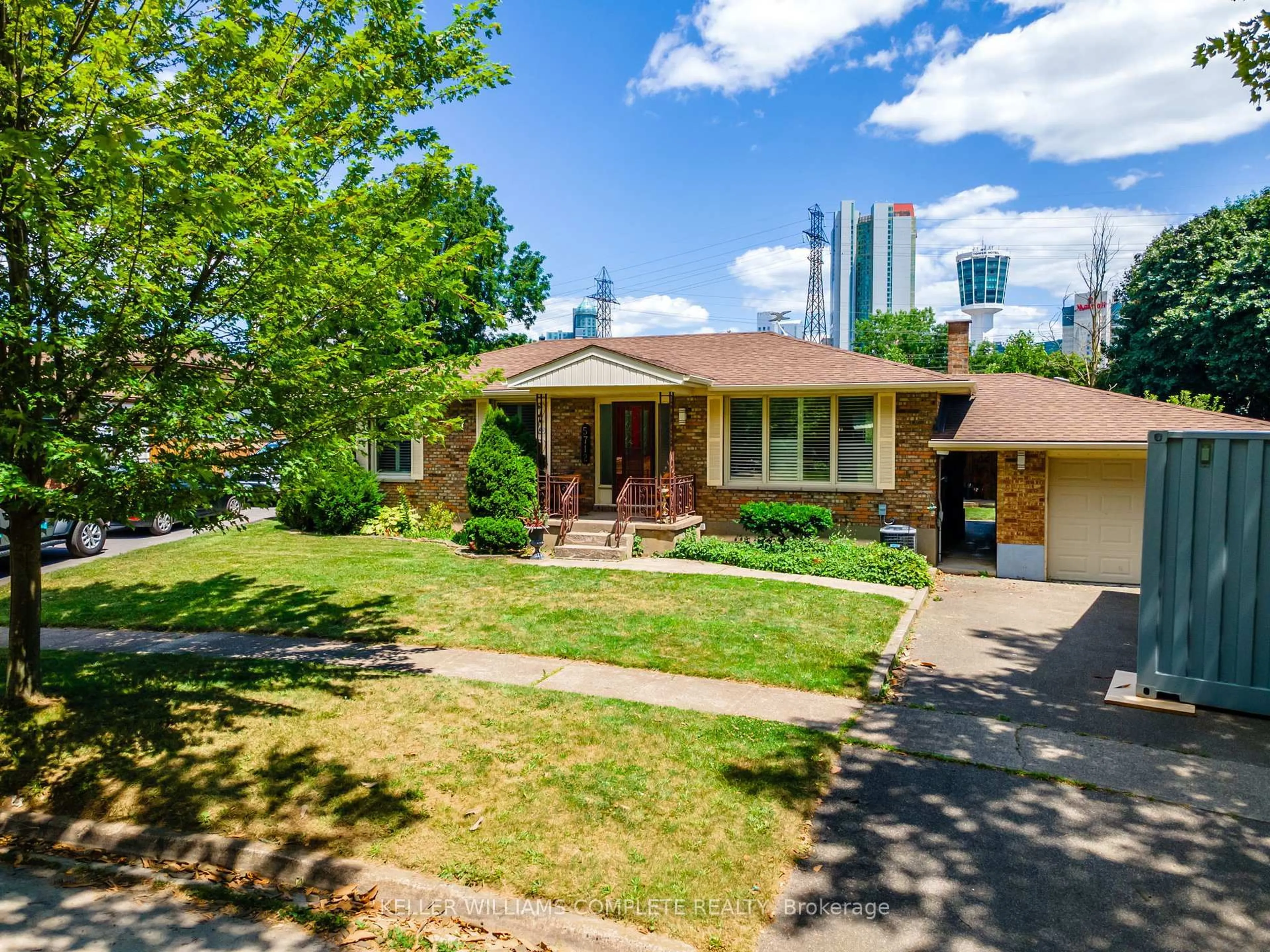 Home with brick exterior material, street for 5712 Sunnylea Cres, Niagara Falls Ontario L2G 2R9