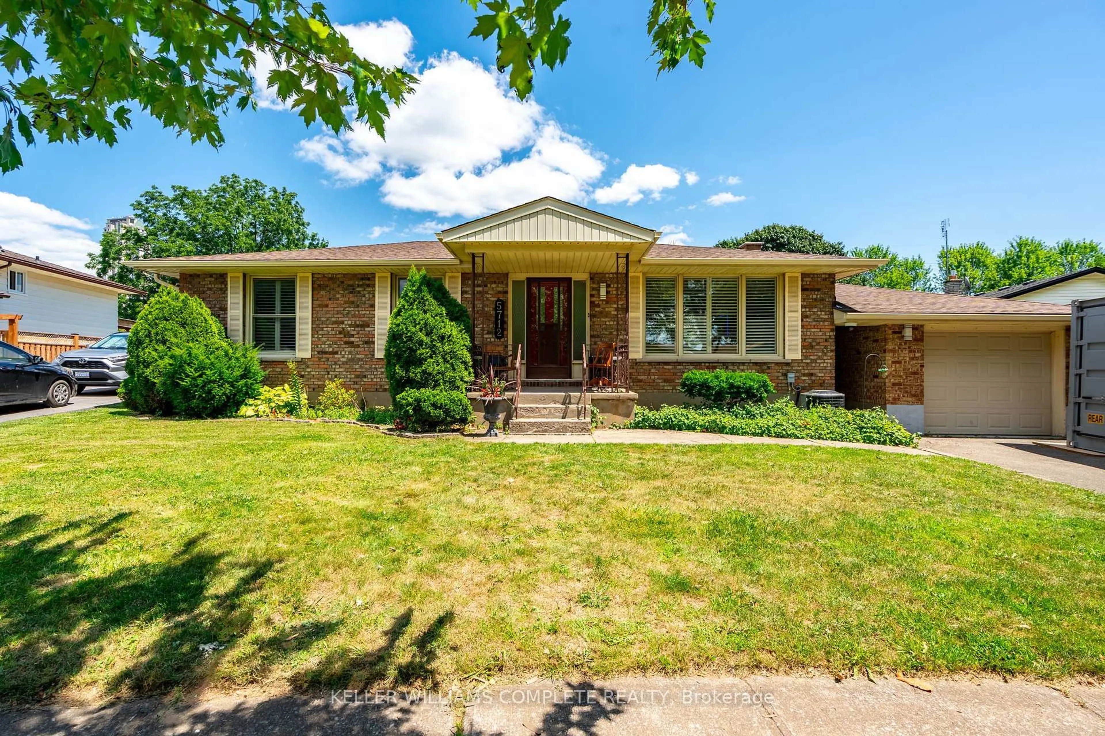 Home with brick exterior material, street for 5712 Sunnylea Cres, Niagara Falls Ontario L2G 2R9