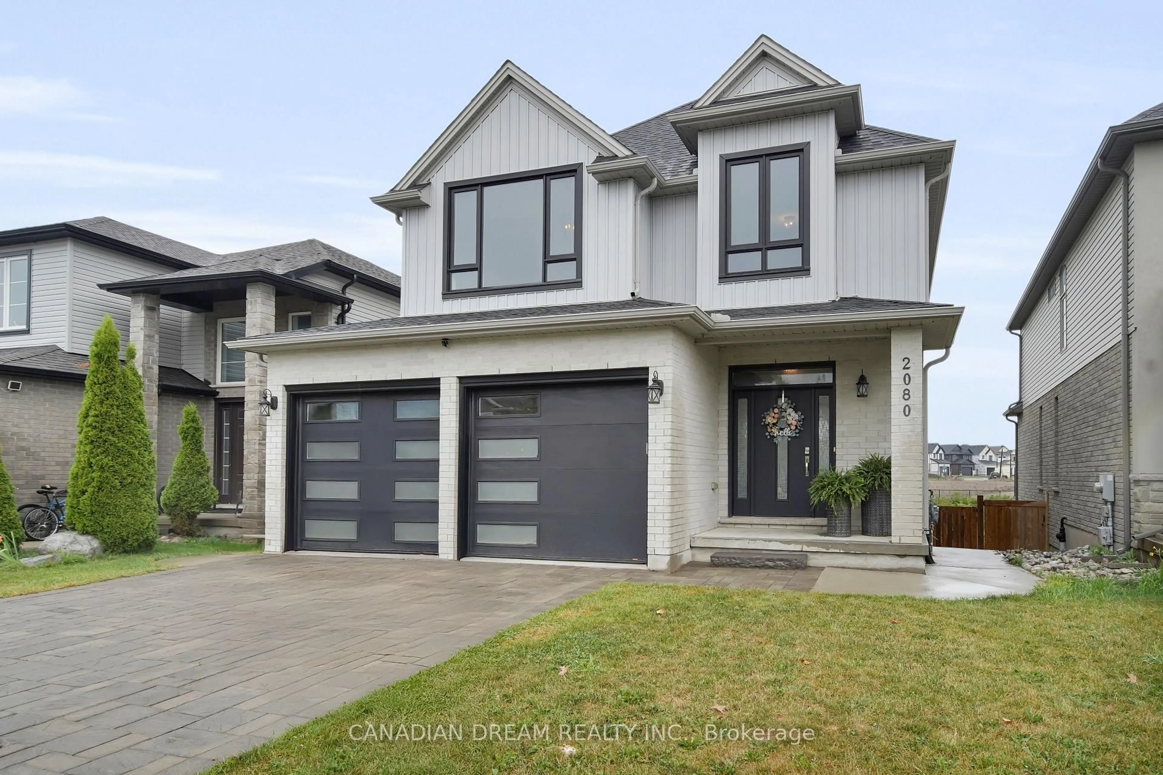 Home with vinyl exterior material, street for 2080 Wateroak Dr, London North Ontario N6G 0P9