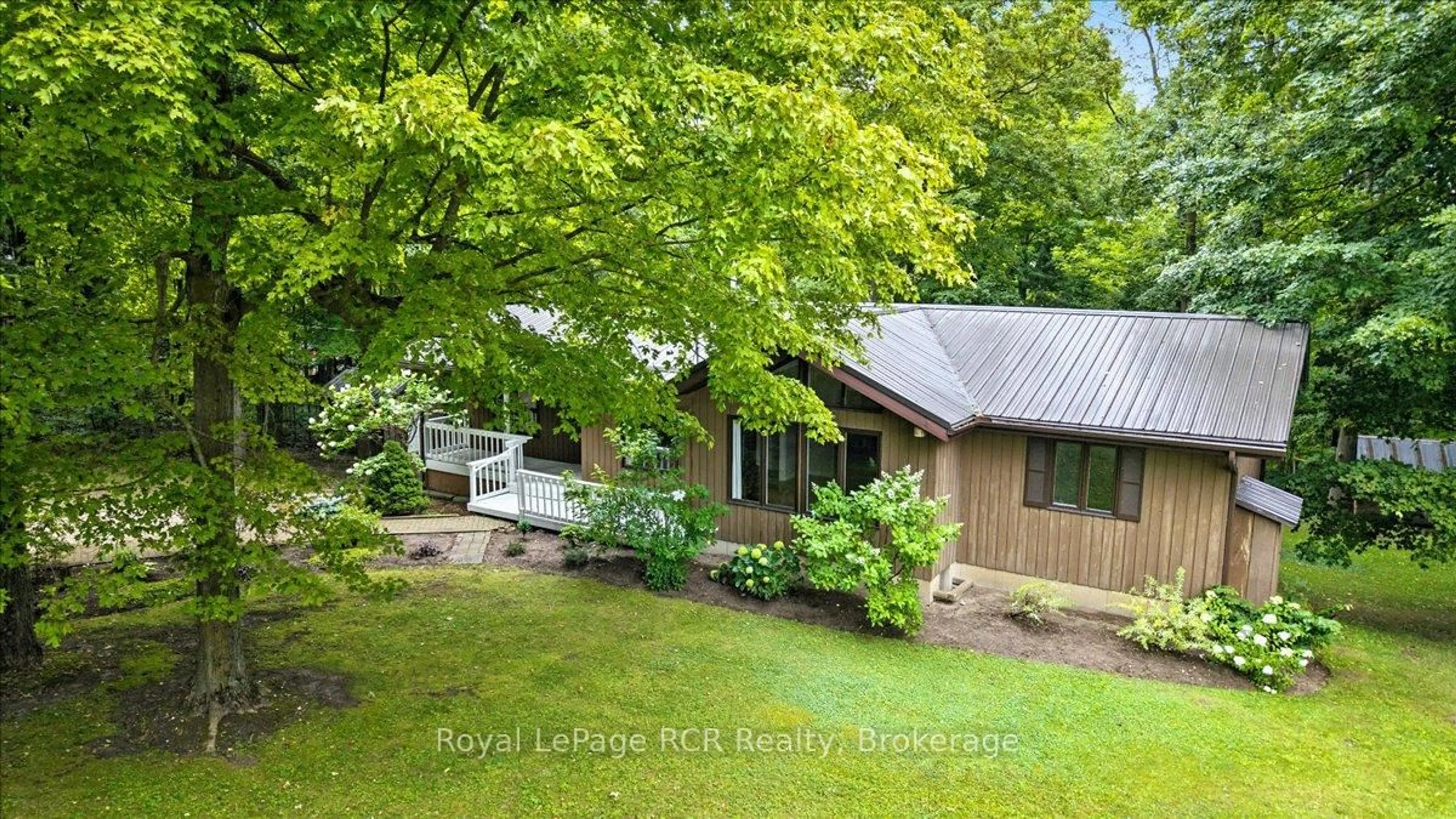 A pic from outside/outdoor area/front of a property/back of a property/a pic from drone, unknown for 214333 Baseline Rd, West Grey Ontario N0G 1S0