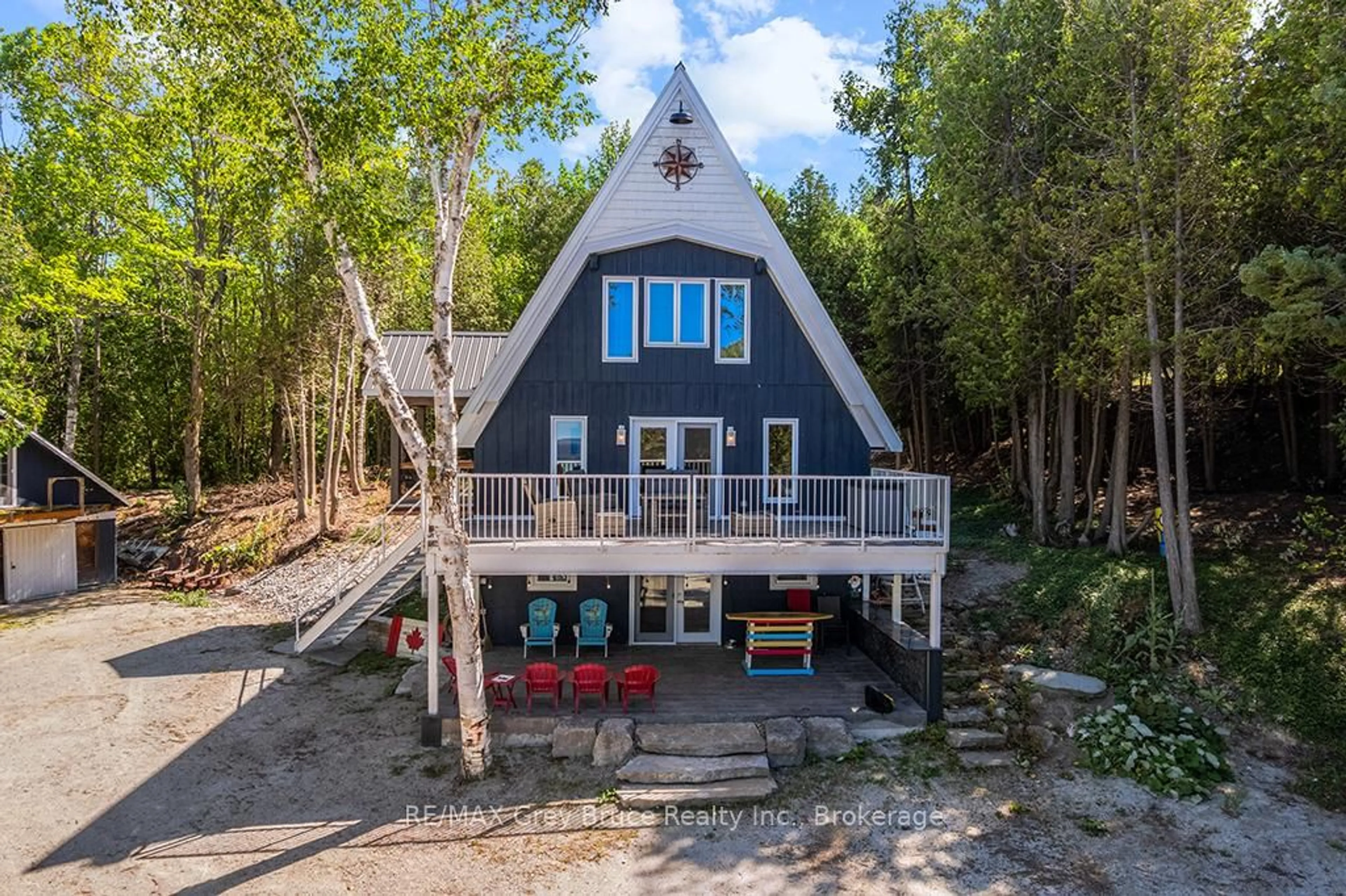A pic from outside/outdoor area/front of a property/back of a property/a pic from drone, water/lake/river/ocean view for 504075 Grey Road 1 Rd, Georgian Bluffs Ontario N0H 2T0