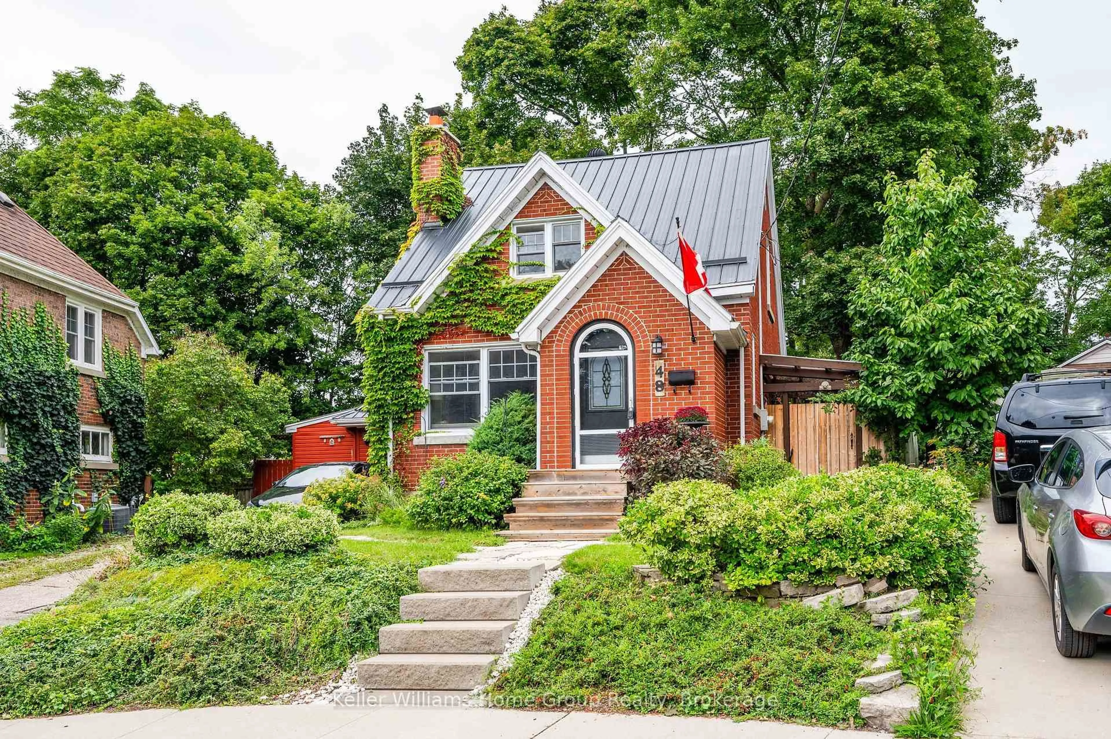 Home with brick exterior material, street for 48 Dane St, Kitchener Ontario N2H 3H7