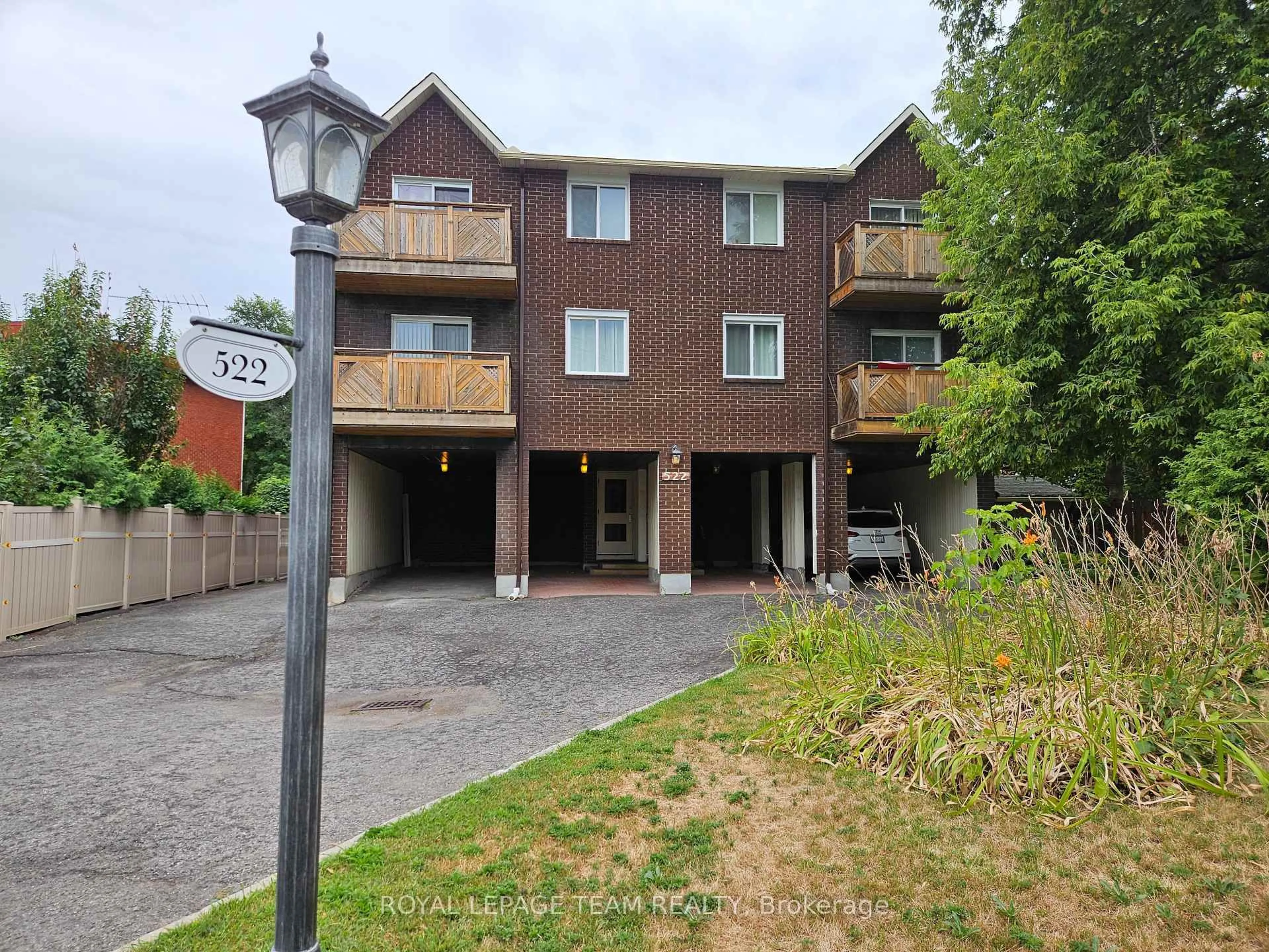 A pic from outside/outdoor area/front of a property/back of a property/a pic from drone, unknown for 522 Riverdale Ave #5, Ottawa Ontario K1S 1S5