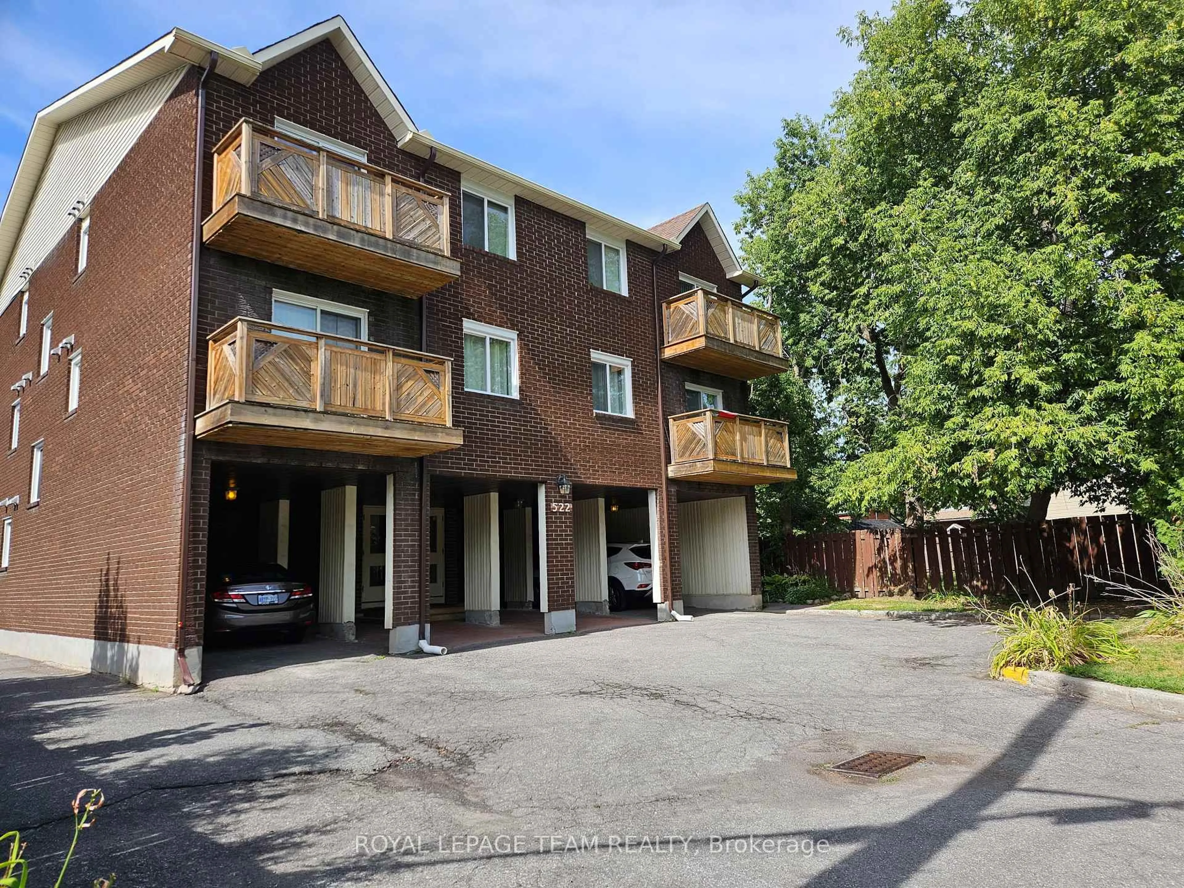 A pic from outside/outdoor area/front of a property/back of a property/a pic from drone, street for 522 Riverdale Ave #5, Ottawa Ontario K1S 1S5