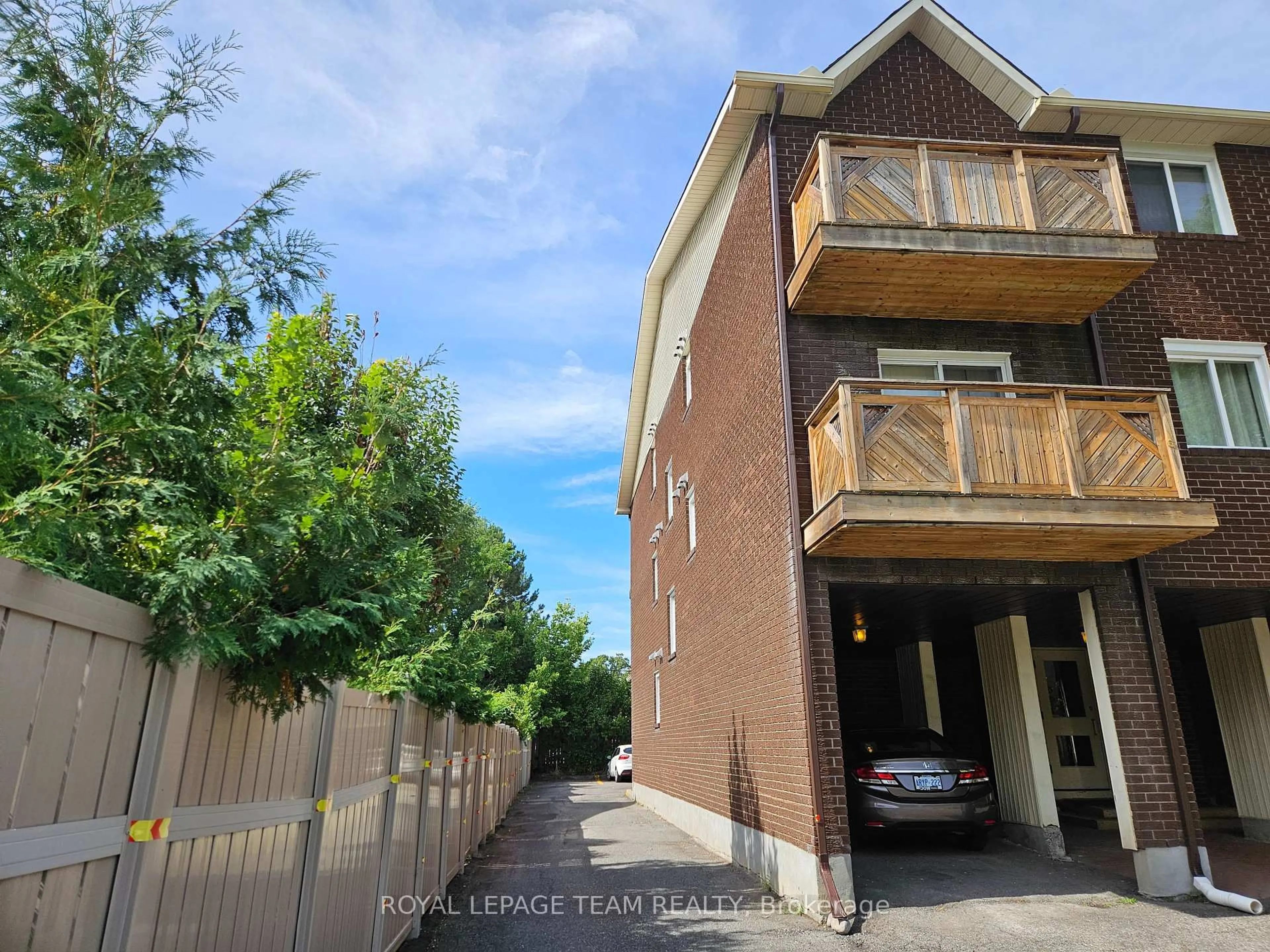 A pic from outside/outdoor area/front of a property/back of a property/a pic from drone, street for 522 Riverdale Ave #5, Ottawa Ontario K1S 1S5