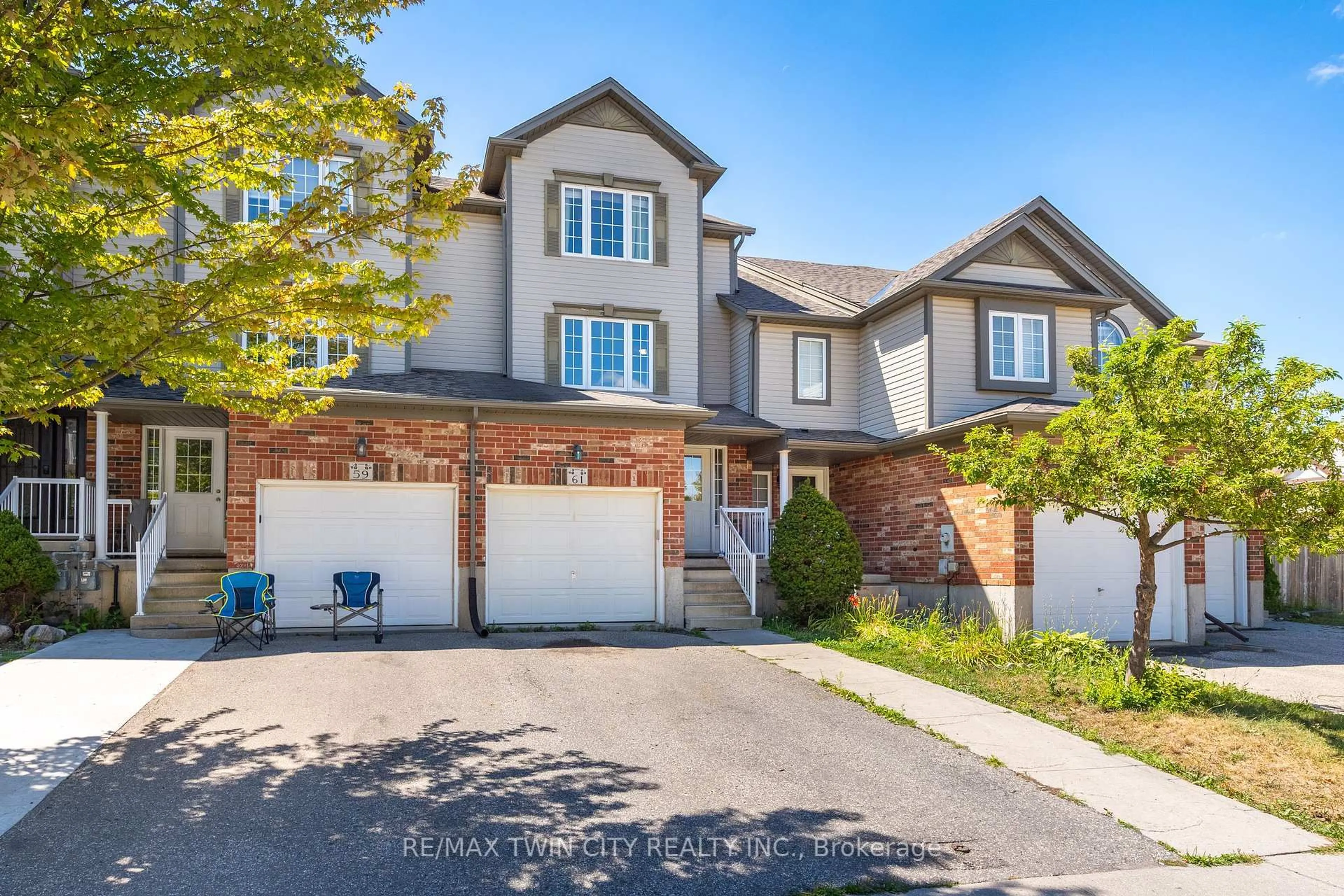 Home with brick exterior material, street for 61 Madeleine St, Kitchener Ontario N2R 1V4