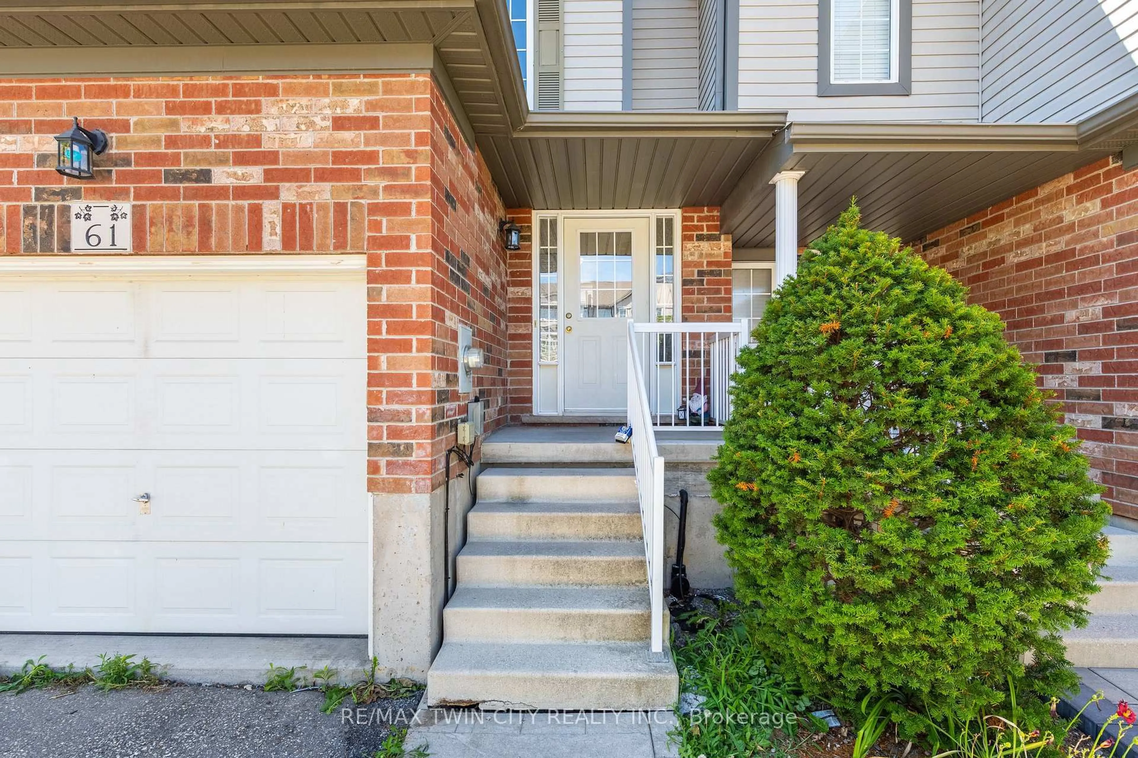 Home with brick exterior material, street for 61 Madeleine St, Kitchener Ontario N2R 1V4
