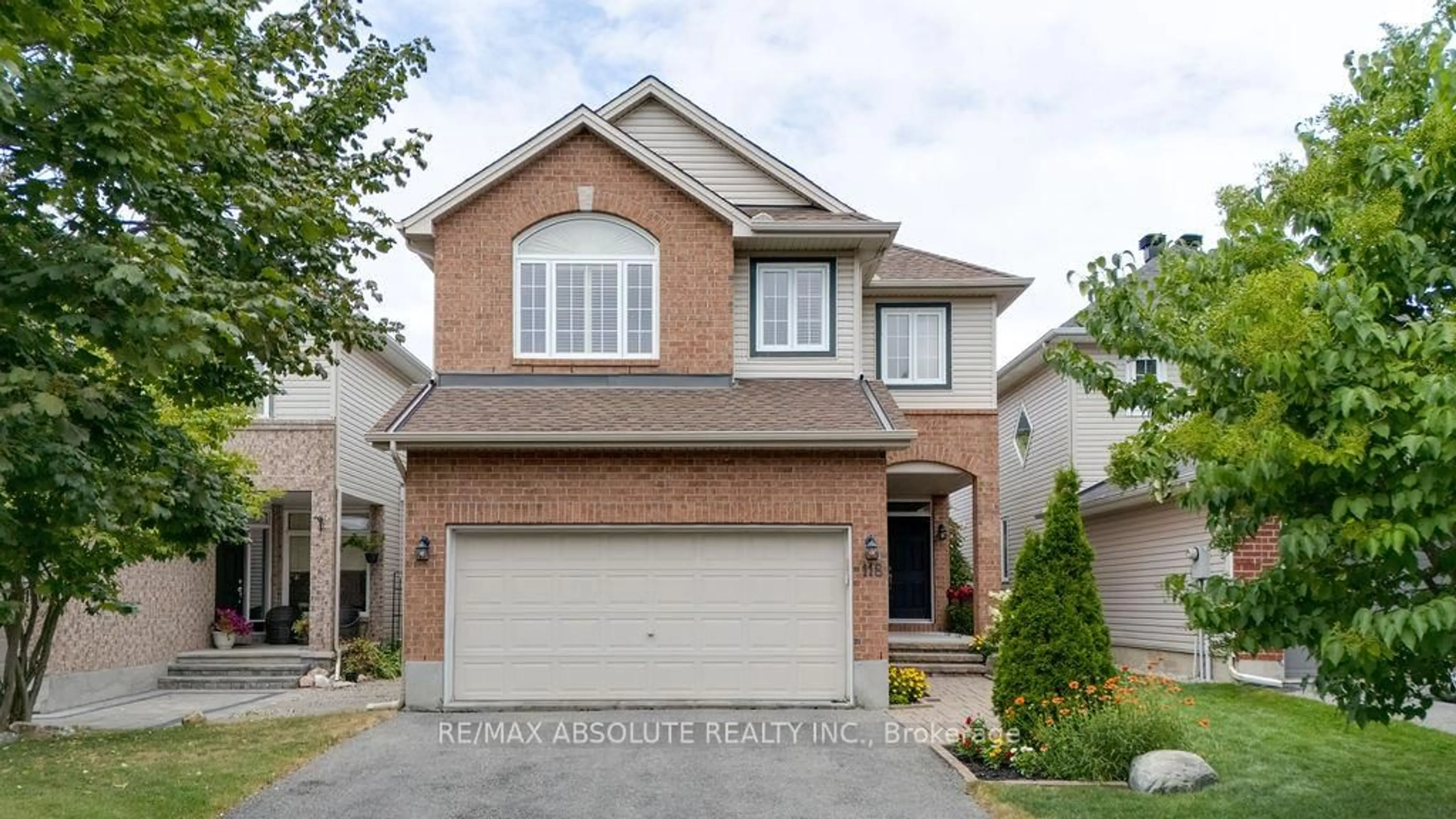Home with brick exterior material, street for 118 Spiritwood Dr, Ottawa Ontario K2M 3A2