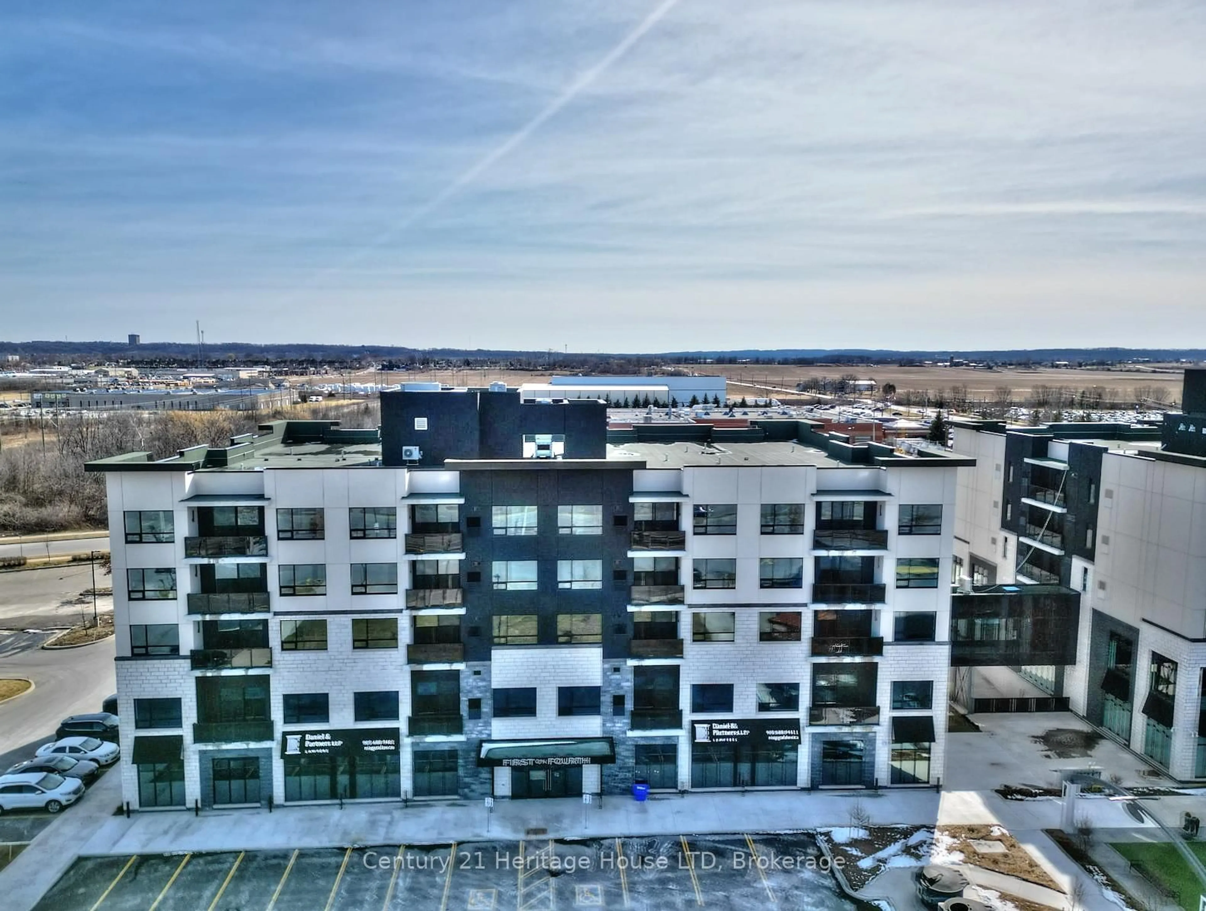 A pic from outside/outdoor area/front of a property/back of a property/a pic from drone, city buildings view from balcony for 300B Fourth Ave #407, St. Catharines Ontario L2S 0E6