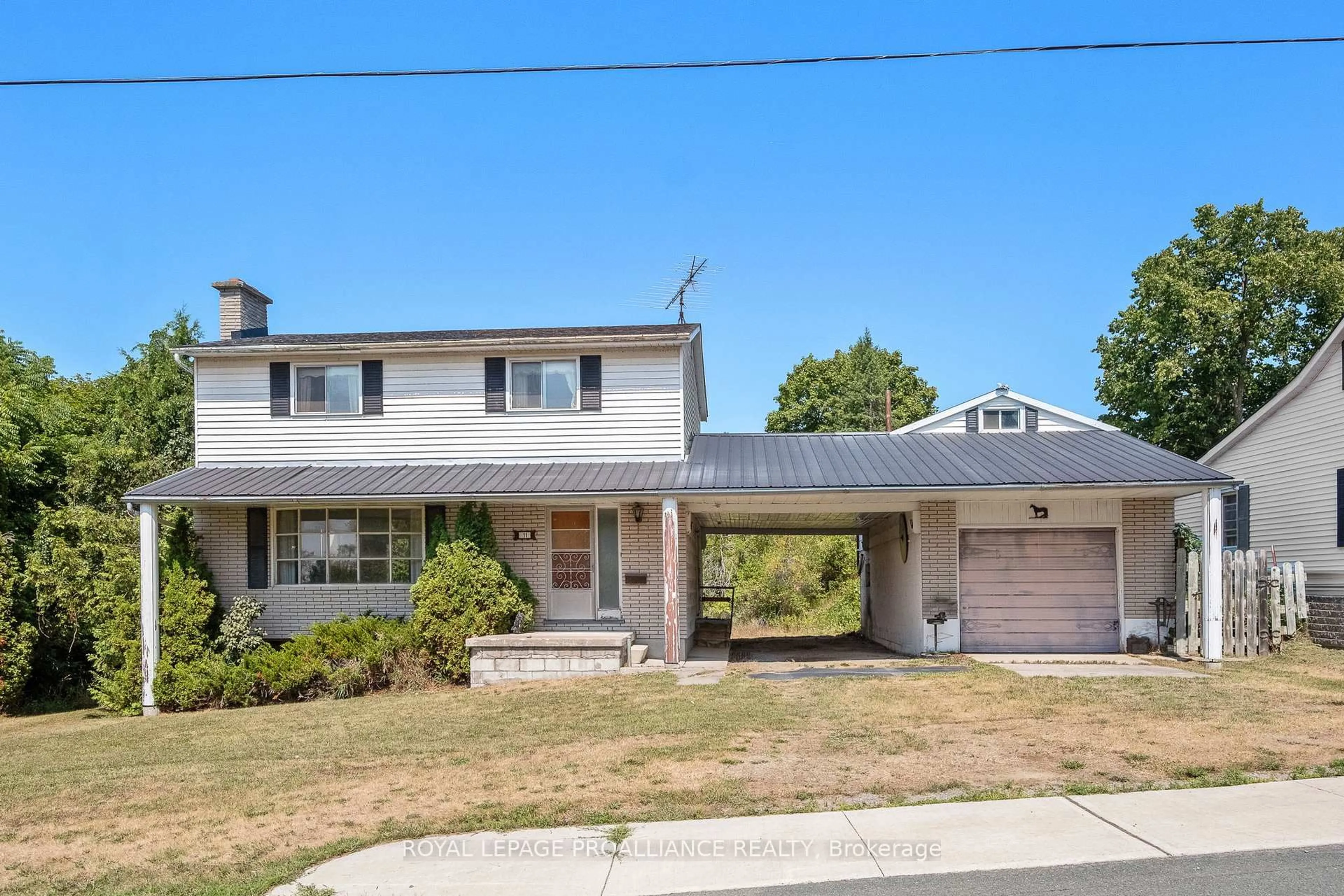 Home with vinyl exterior material, street for 11 Division St, Trent Hills Ontario K0L 1Y0