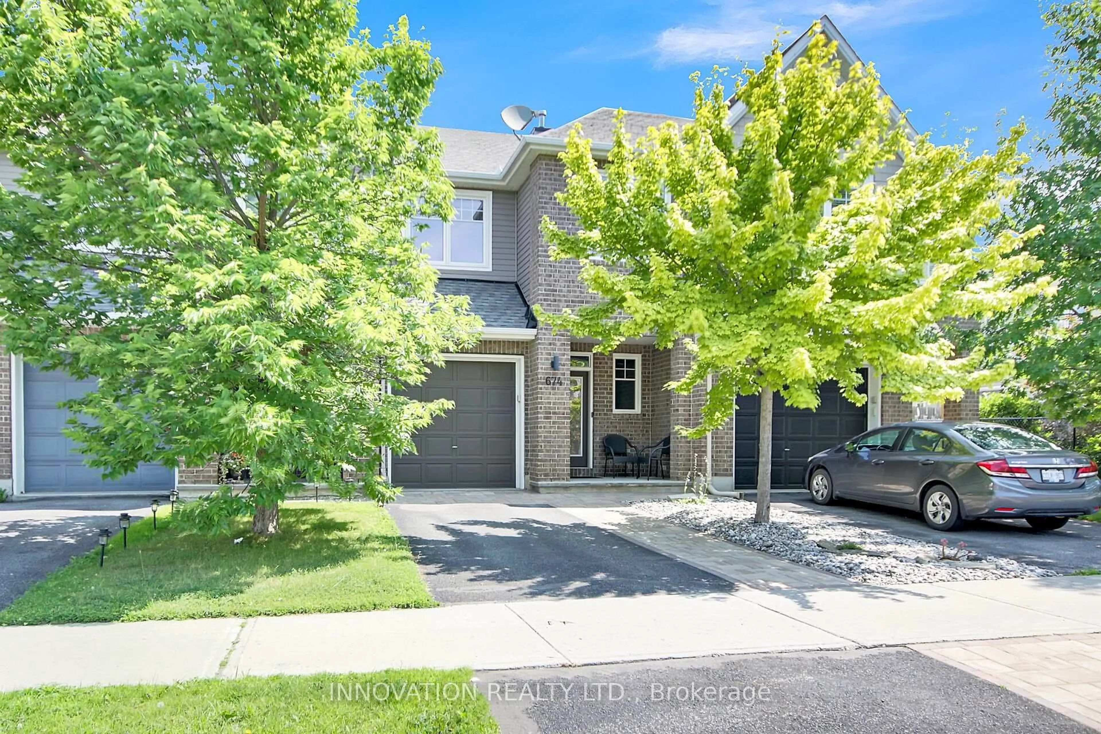 A pic from outside/outdoor area/front of a property/back of a property/a pic from drone, street for 674 White Alder Ave, Ottawa Ontario K1T 0E7
