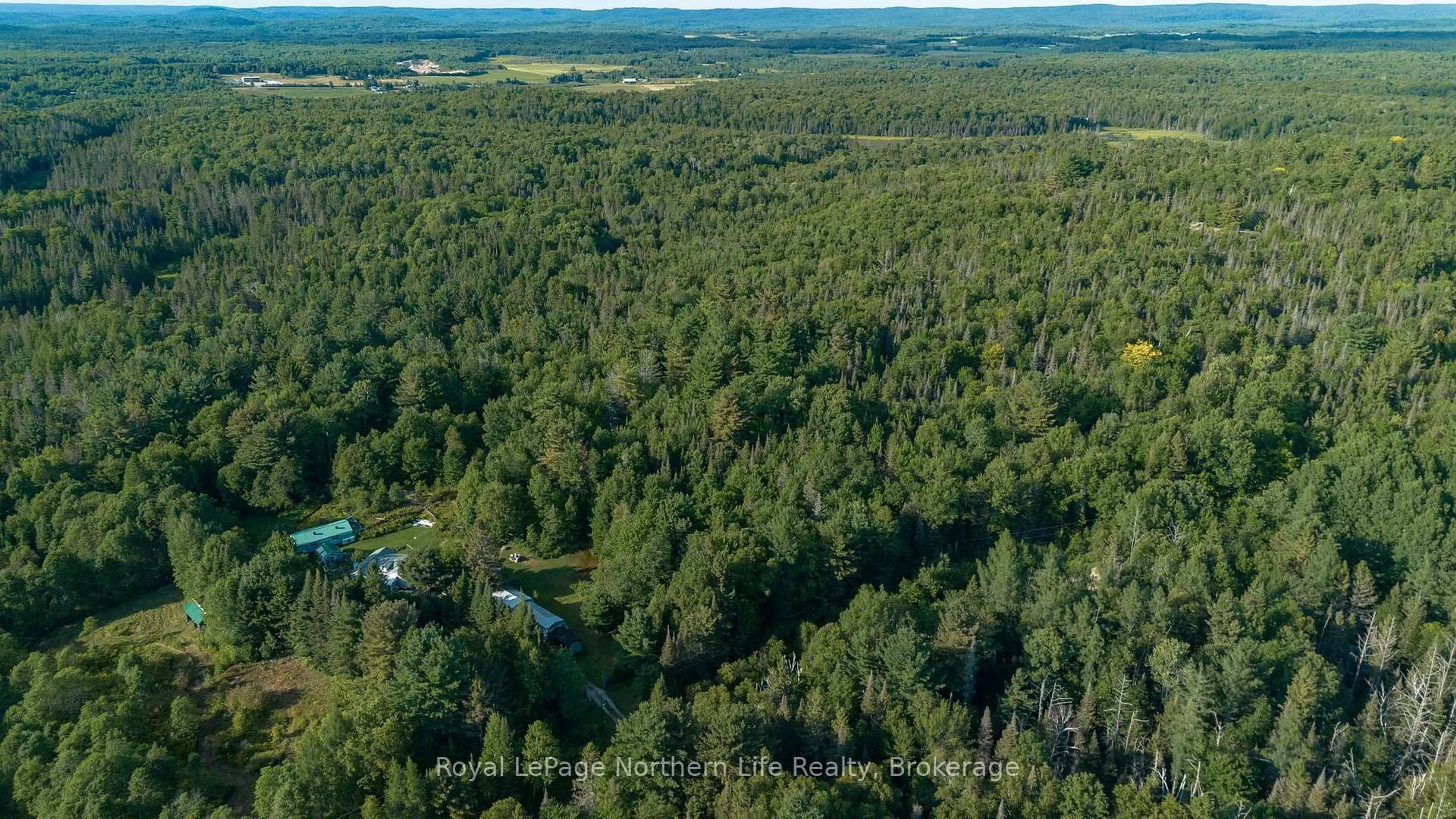 A pic from outside/outdoor area/front of a property/back of a property/a pic from drone, forest/trees view for 137 GRAND DESERT Rd, Bonfield Ontario P0H 1E0