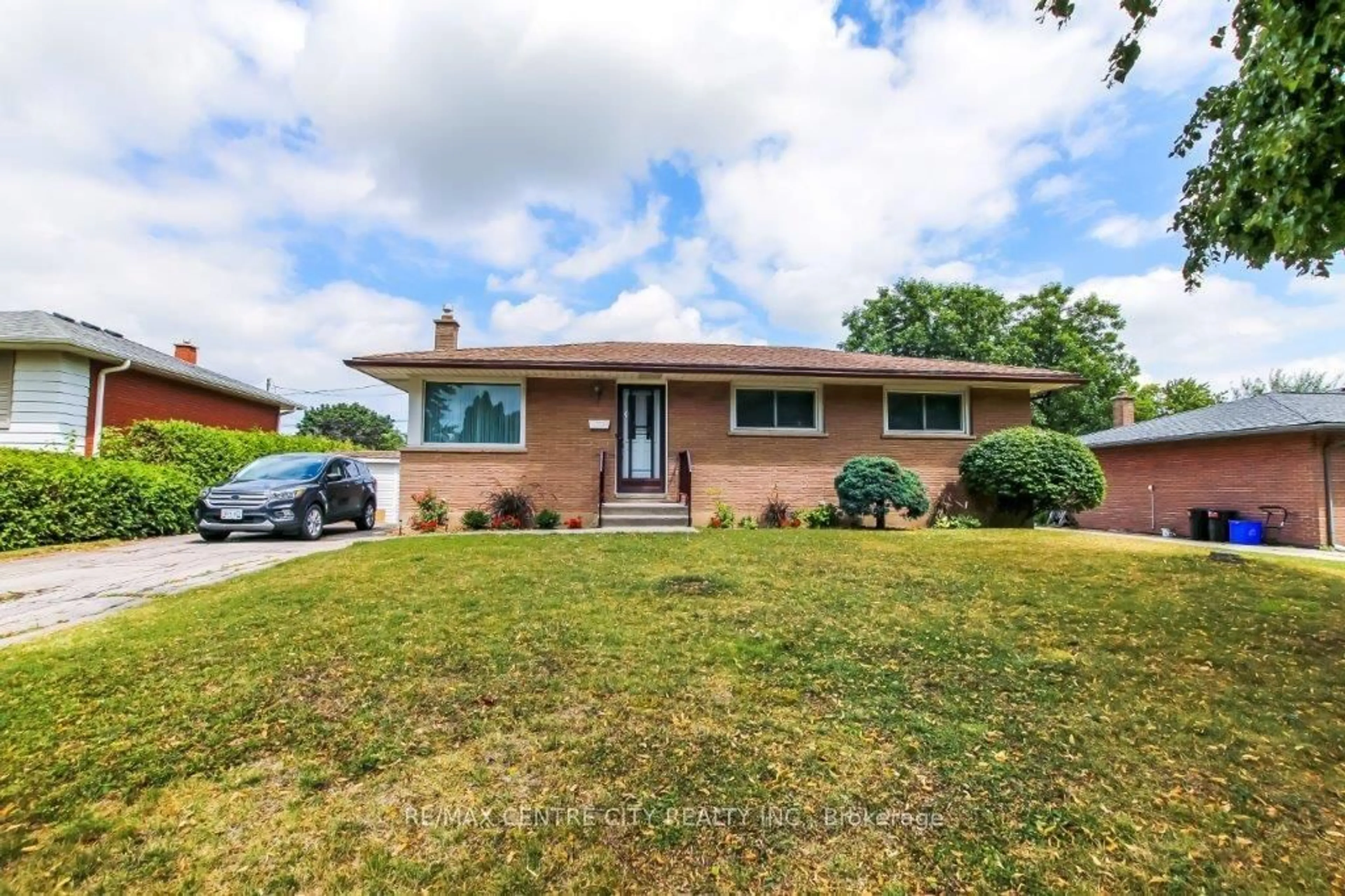 Home with brick exterior material, street for 12 Curtis Ave, London South Ontario N5Z 4G1