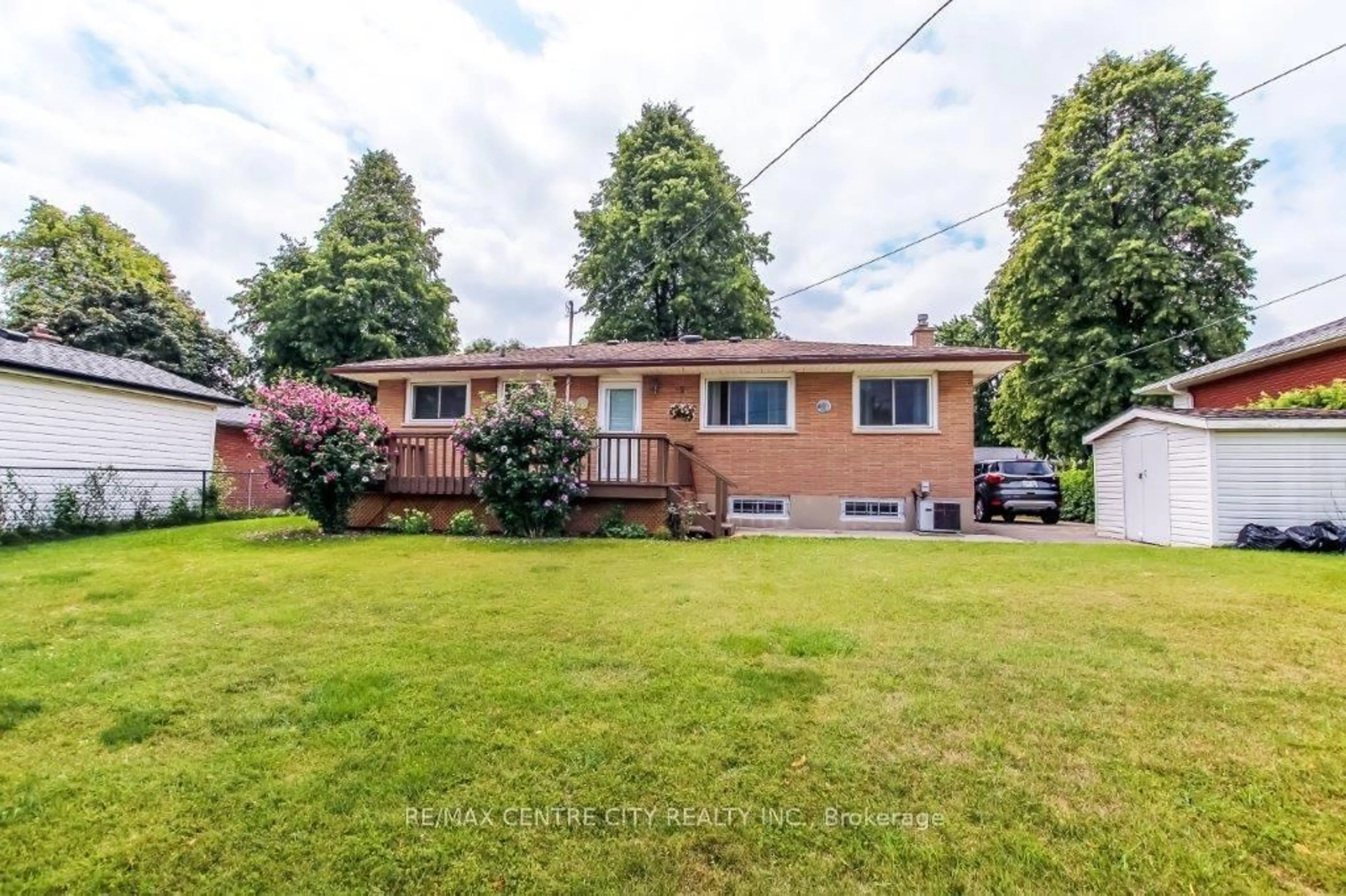 A pic from outside/outdoor area/front of a property/back of a property/a pic from drone, street for 12 Curtis Ave, London South Ontario N5Z 4G1