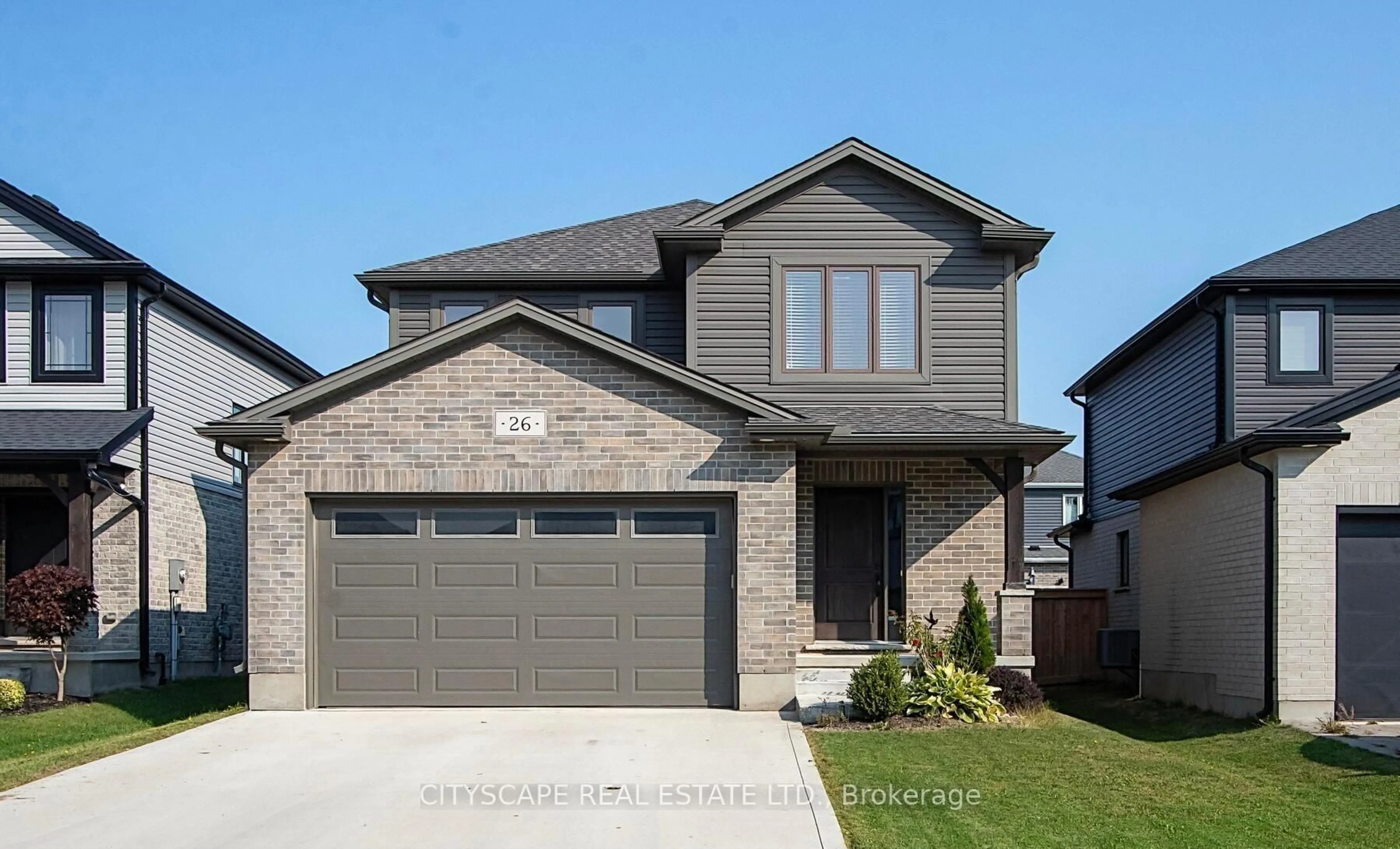 Home with brick exterior material, street for 26 Nicholson St, Lucan Biddulph Ontario N0M 2J0