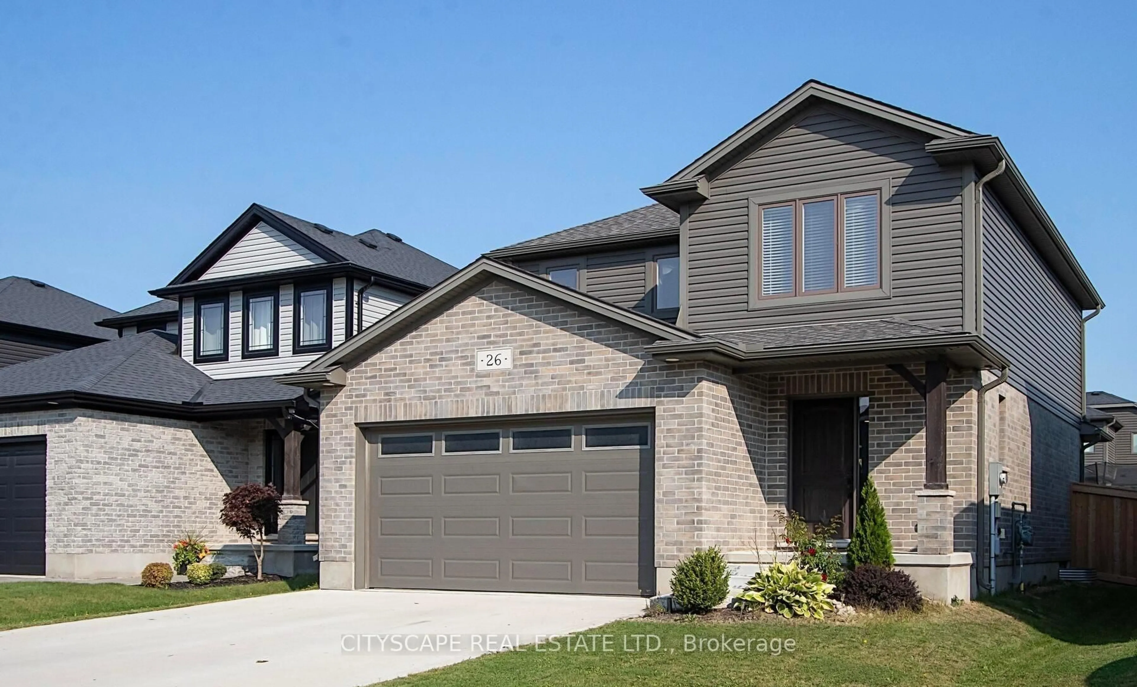 Home with brick exterior material, street for 26 Nicholson St, Lucan Biddulph Ontario N0M 2J0