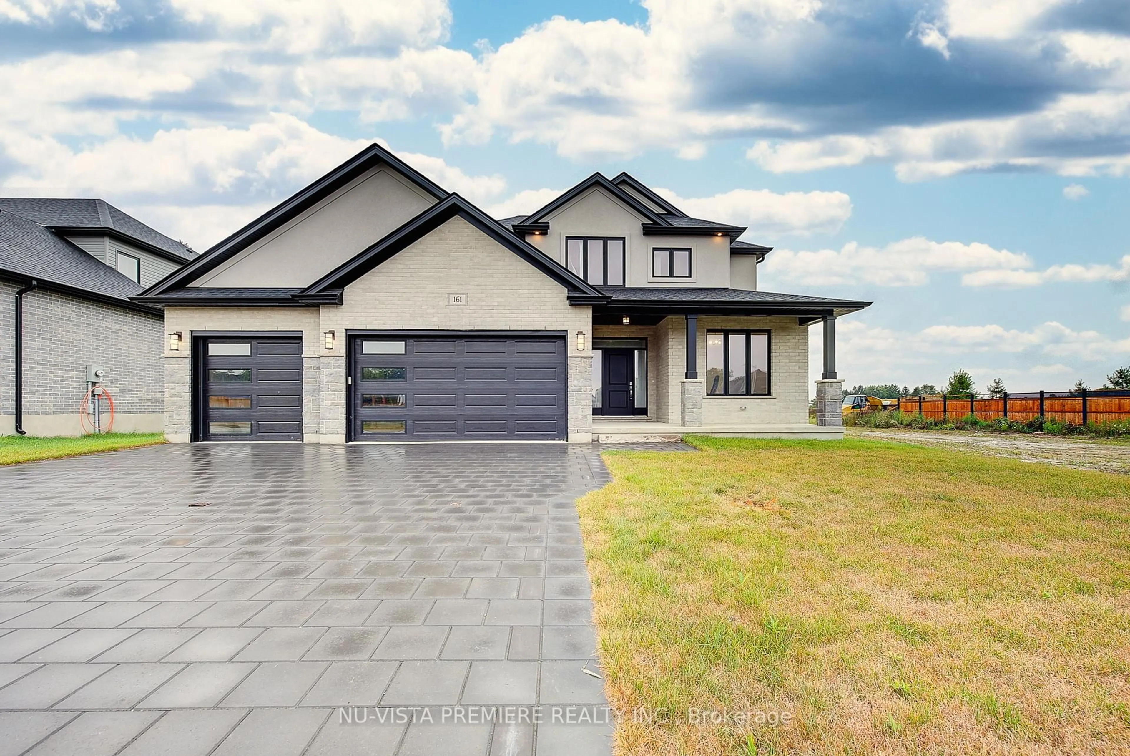 Home with vinyl exterior material, street for 161 Mcleod St, North Middlesex Ontario N0M 2K0