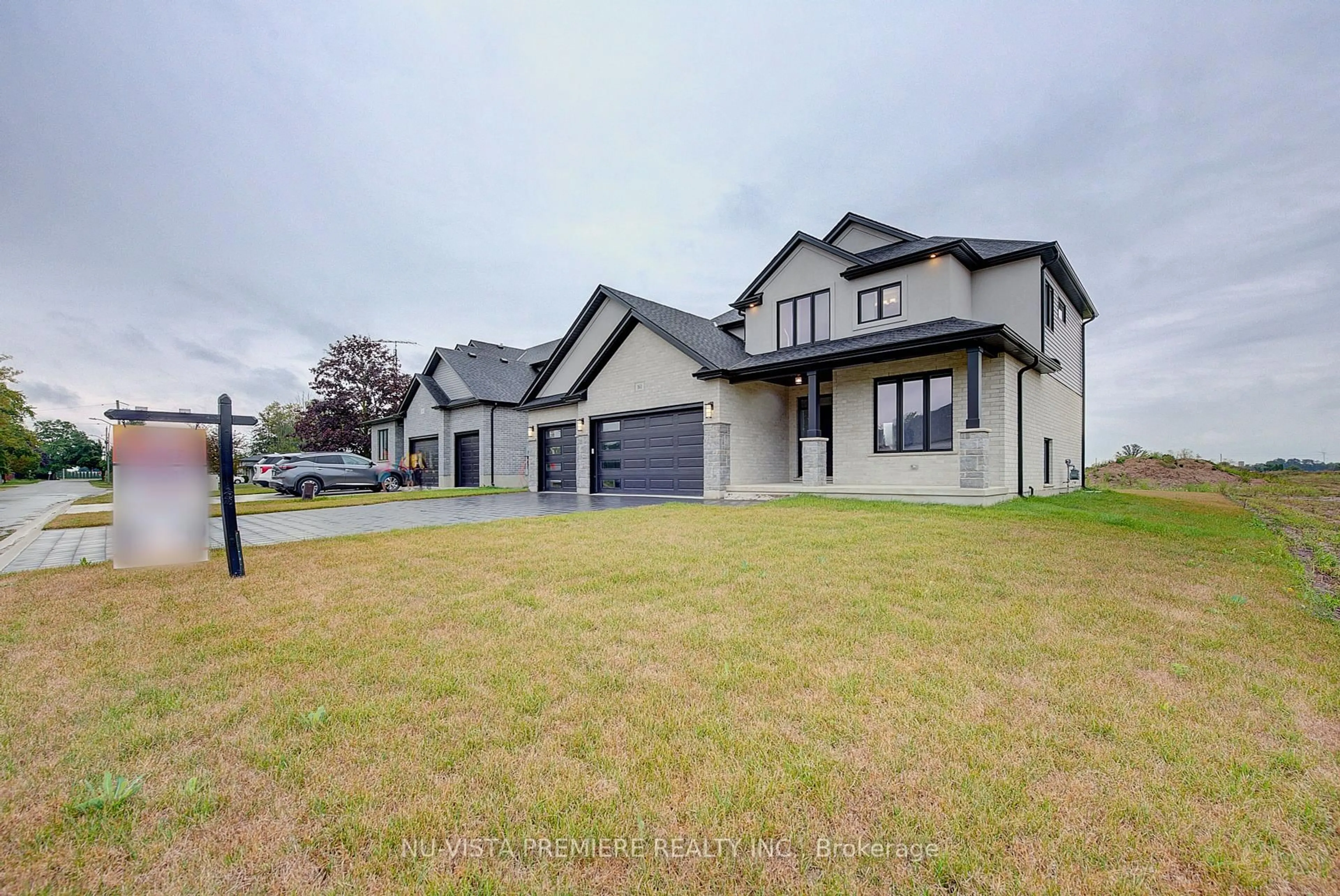 A pic from outside/outdoor area/front of a property/back of a property/a pic from drone, street for 161 Mcleod St, North Middlesex Ontario N0M 2K0