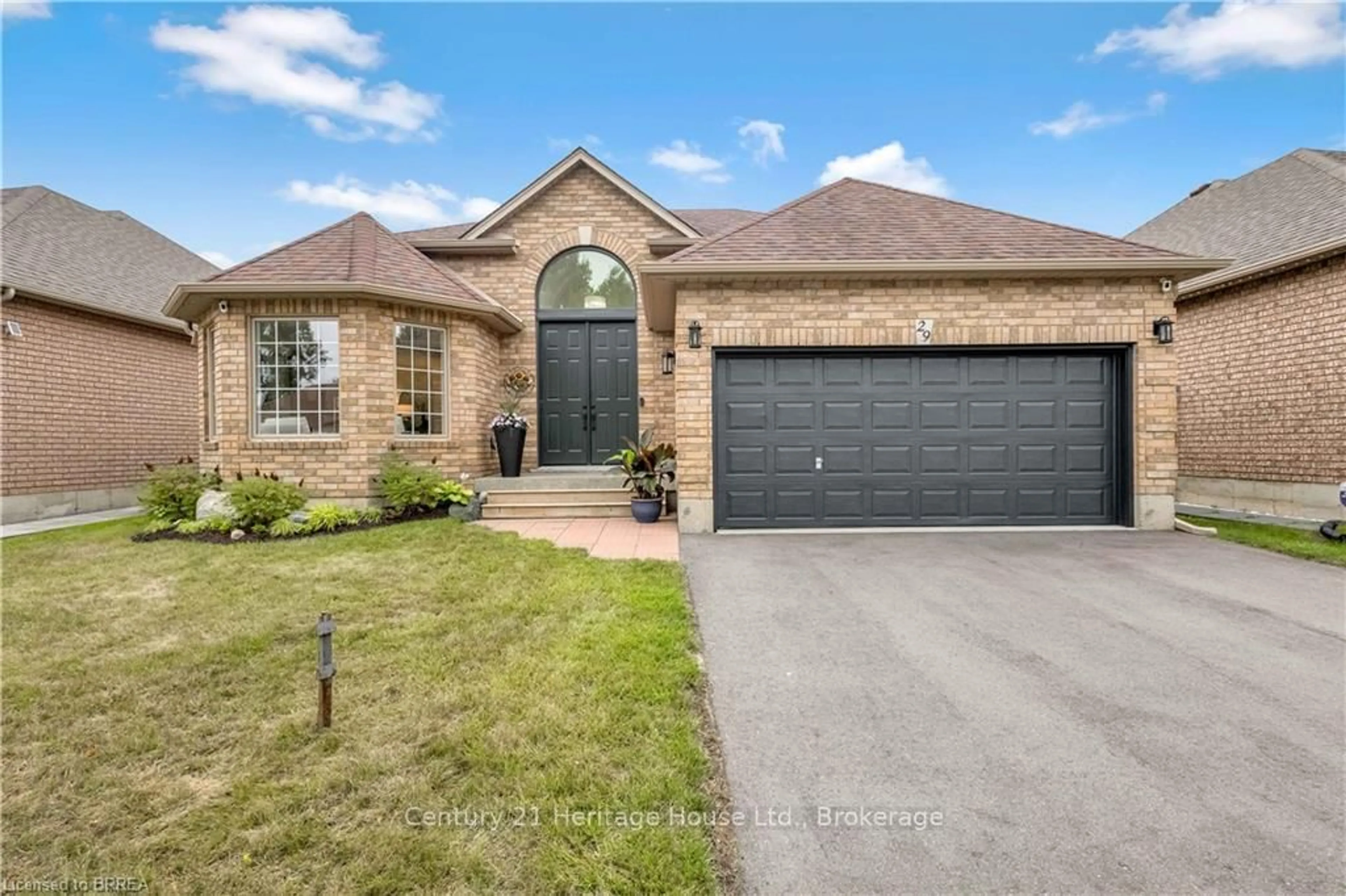 Home with brick exterior material, street for 29 Casson Lane, Brantford Ontario N3R 7Z5