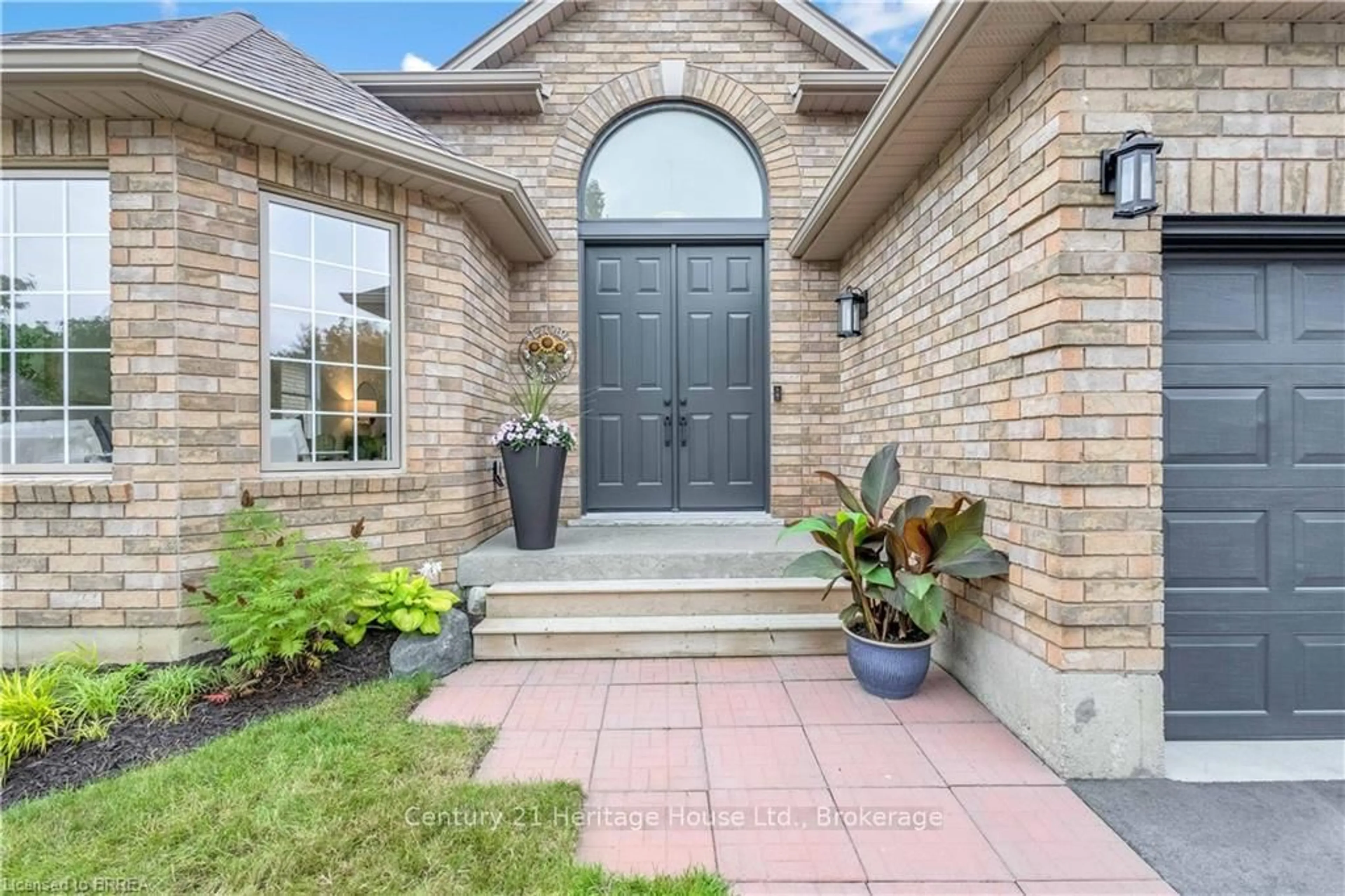 Home with brick exterior material, street for 29 Casson Lane, Brantford Ontario N3R 7Z5