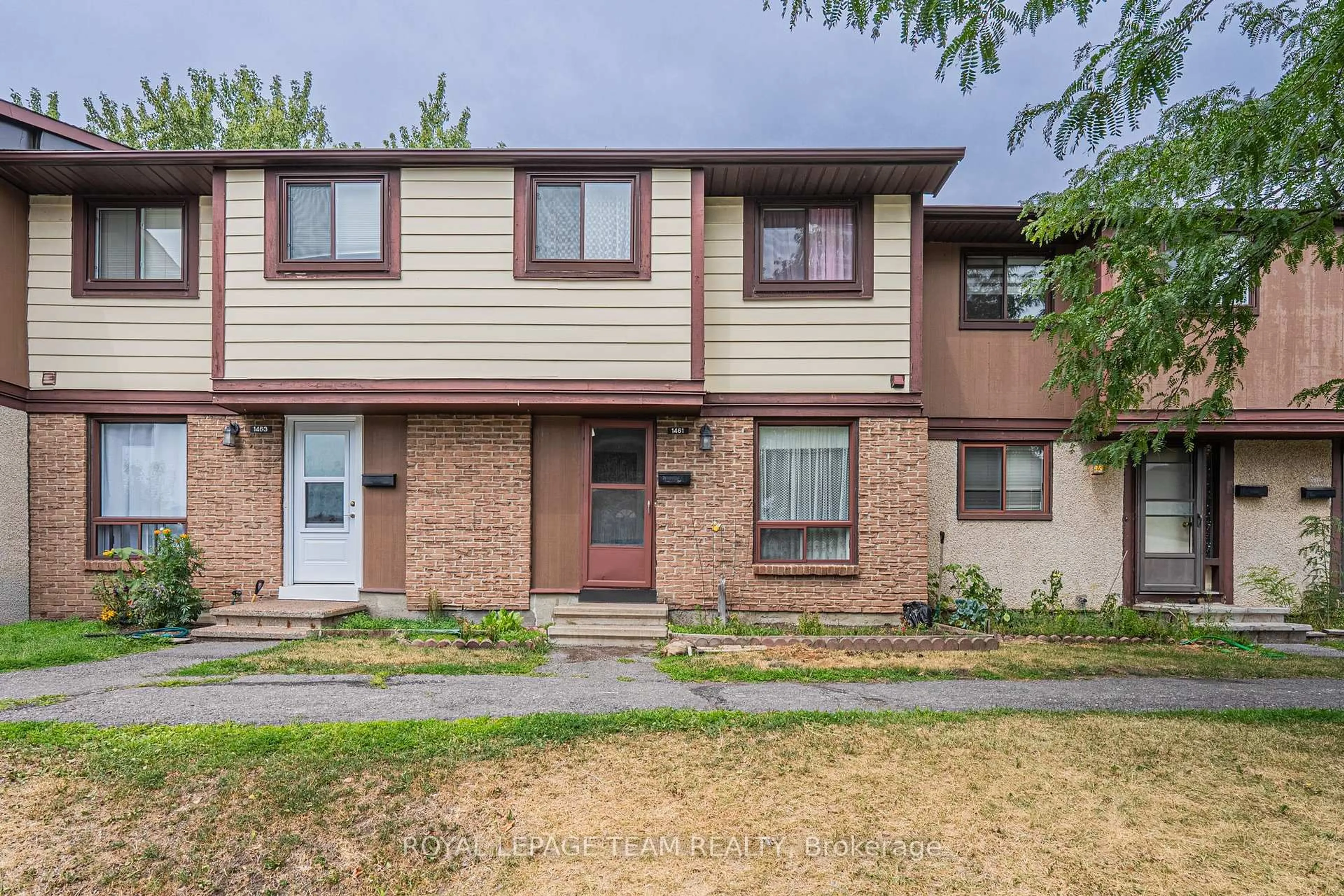 Home with brick exterior material, street for 1461 Murdock Gate, Gloucester Ontario K1J 8R4