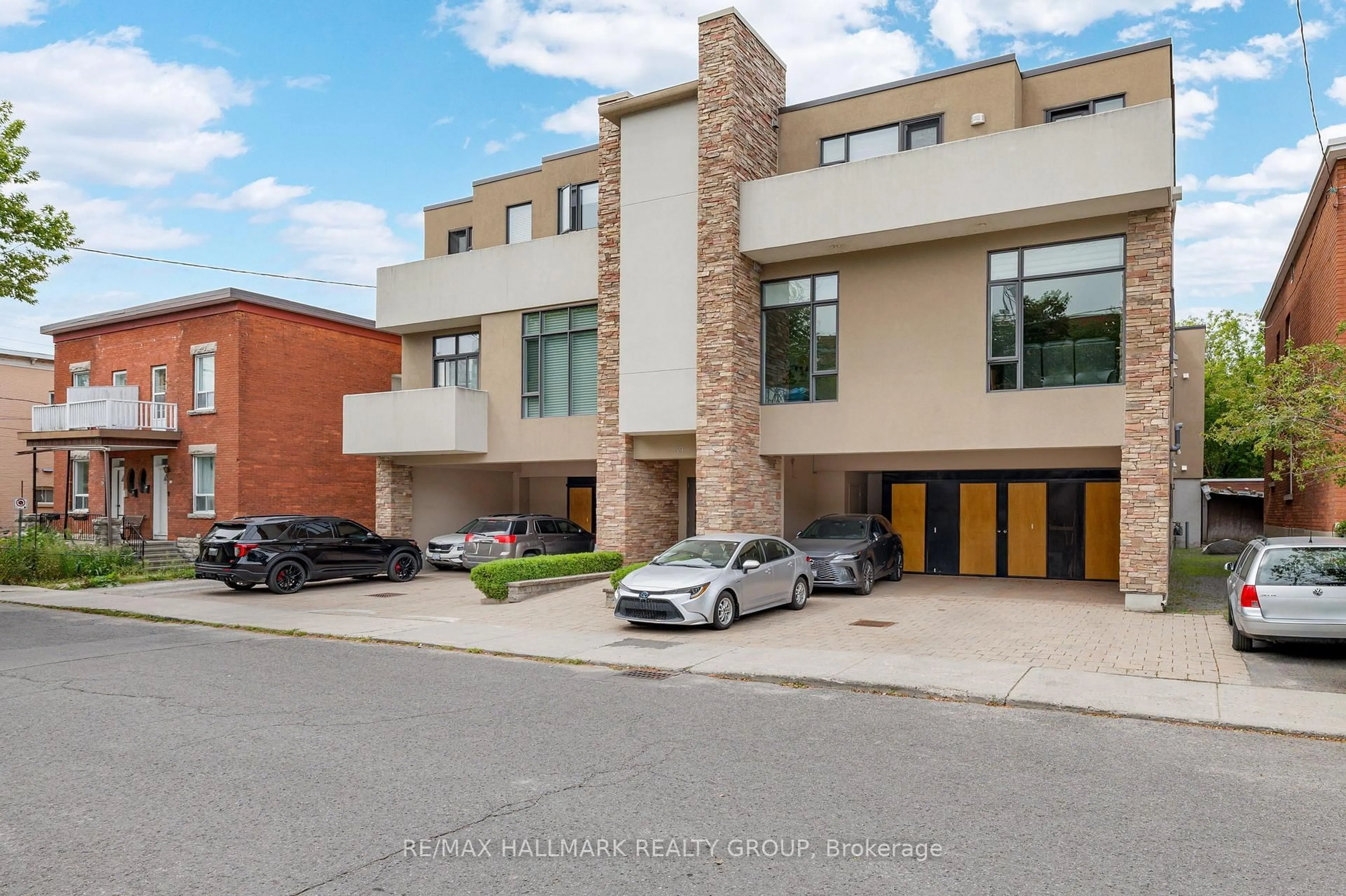 Home with brick exterior material, street for 39 Vaughan St #201, Ottawa Ontario K1M 1W9
