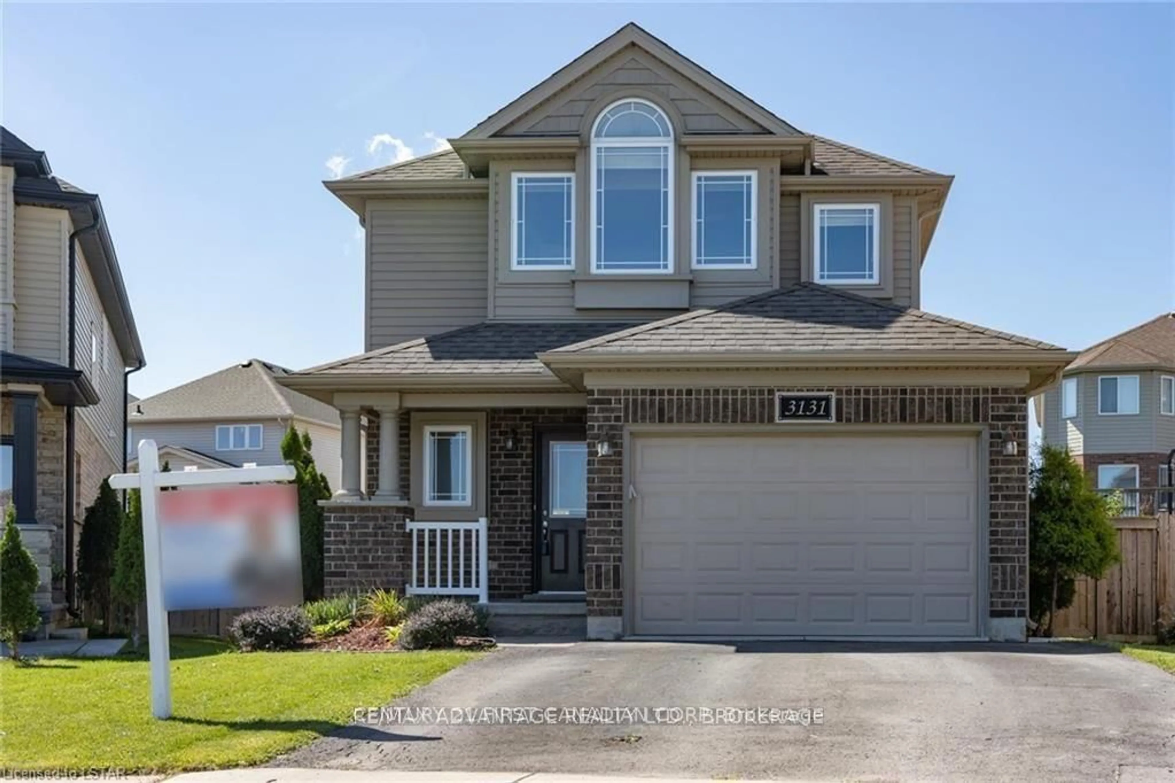 Home with vinyl exterior material, street for 3131 Emily Carr Lane, London South Ontario N6L 0B3