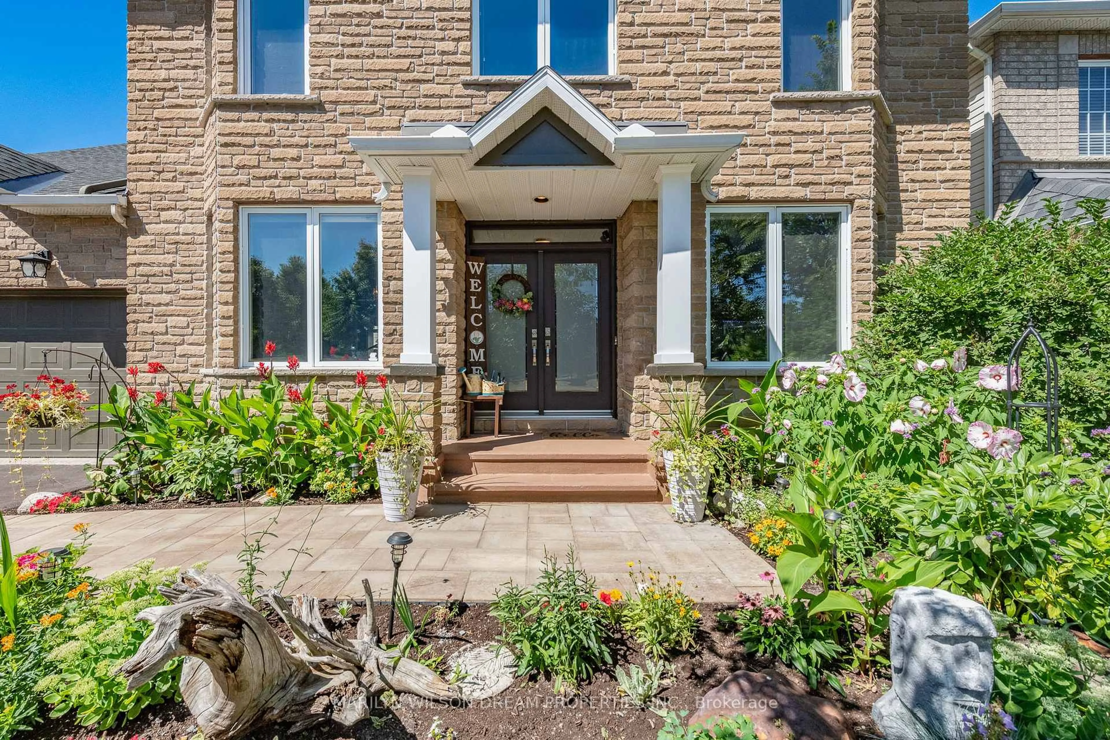 Home with brick exterior material, street for 12 Greenpointe Dr, Ottawa Ontario K2J 4T9