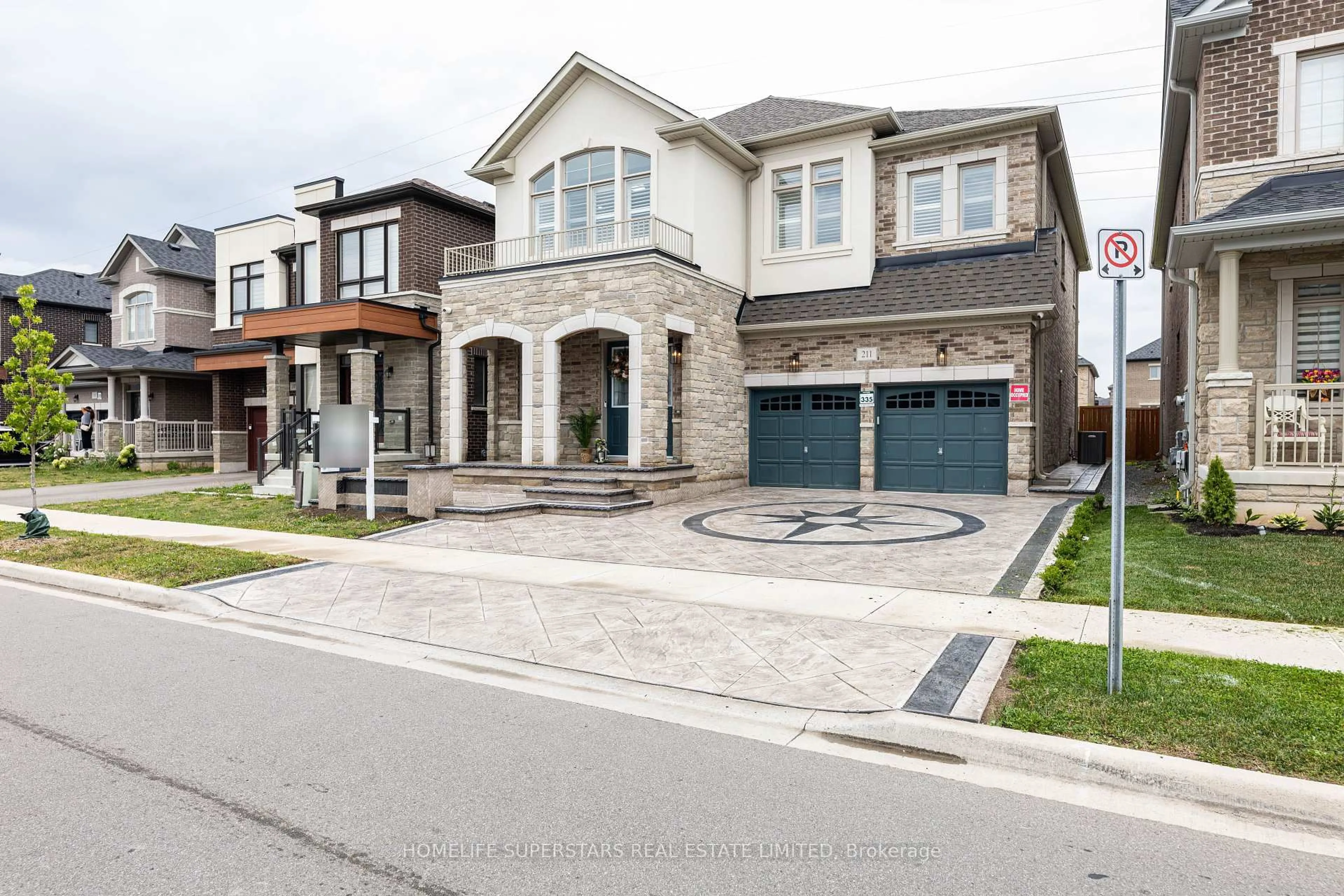 Home with brick exterior material, street for 211 Granite ridge Tr, Hamilton Ontario L8B 1Z1
