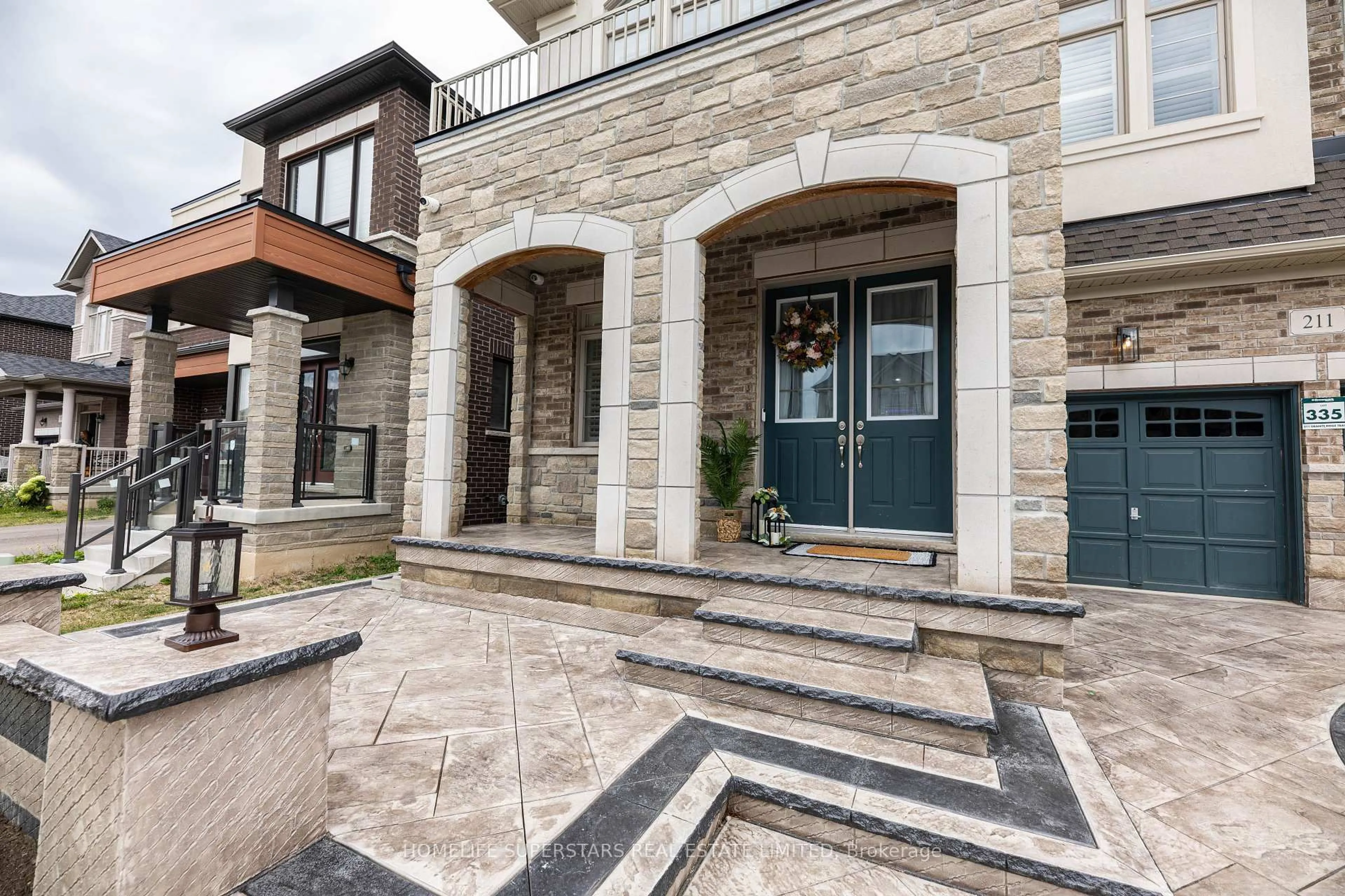 Home with brick exterior material, street for 211 Granite ridge Tr, Hamilton Ontario L8B 1Z1