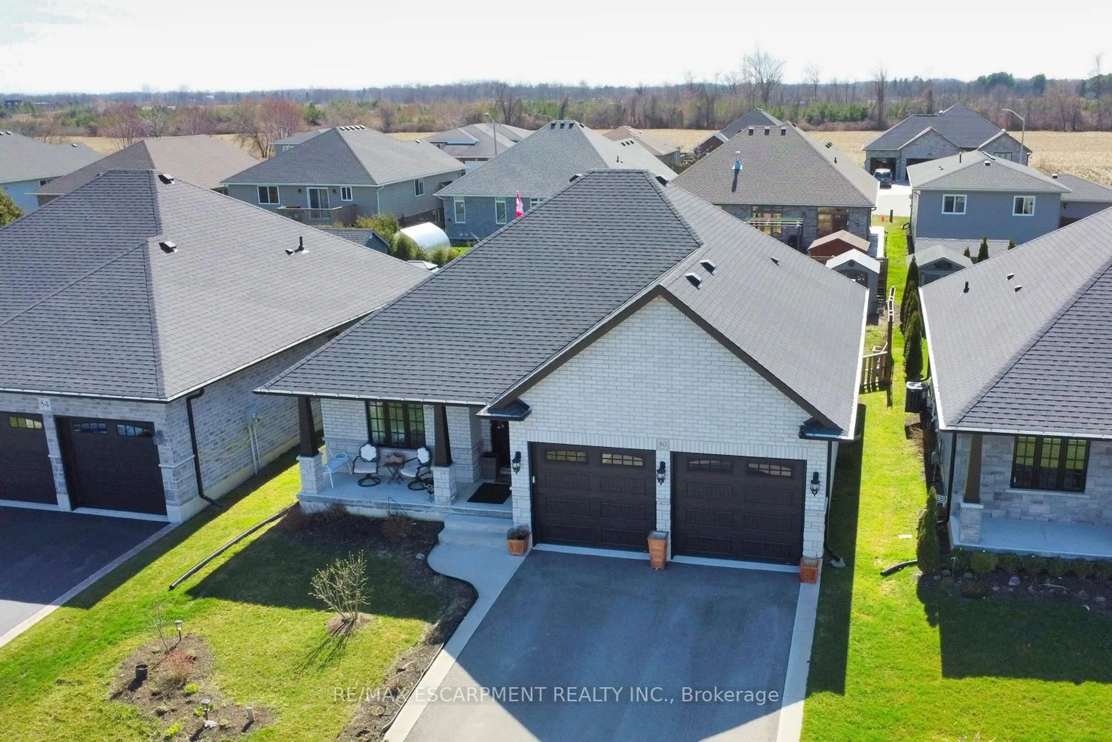 A pic from outside/outdoor area/front of a property/back of a property/a pic from drone, street for 80 Backus Dr, Norfolk Ontario N0E 1M0