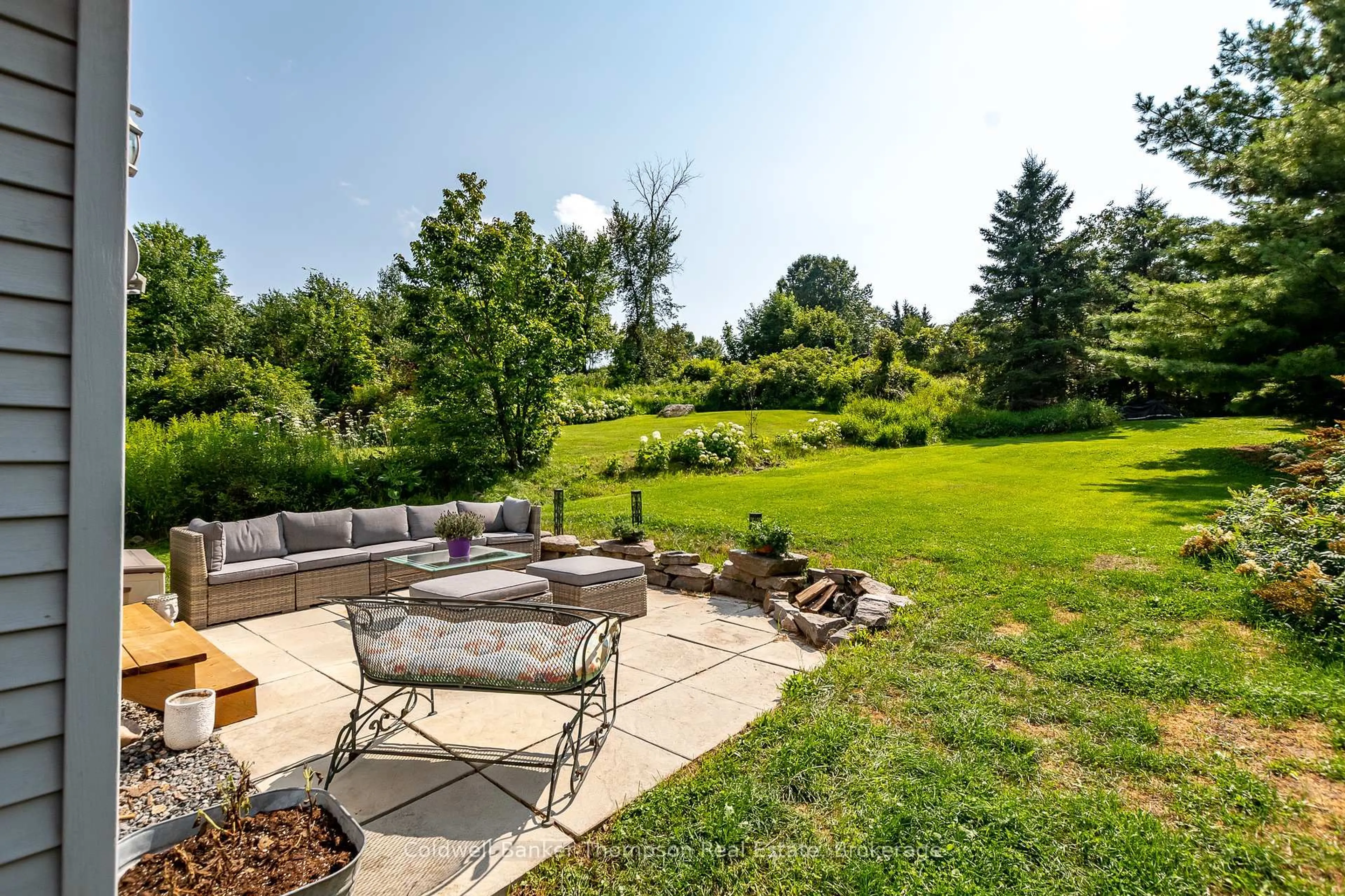 Patio, water/lake/river/ocean view for 15 Covered Bridge Tr, Bracebridge Ontario P1L 1Y1
