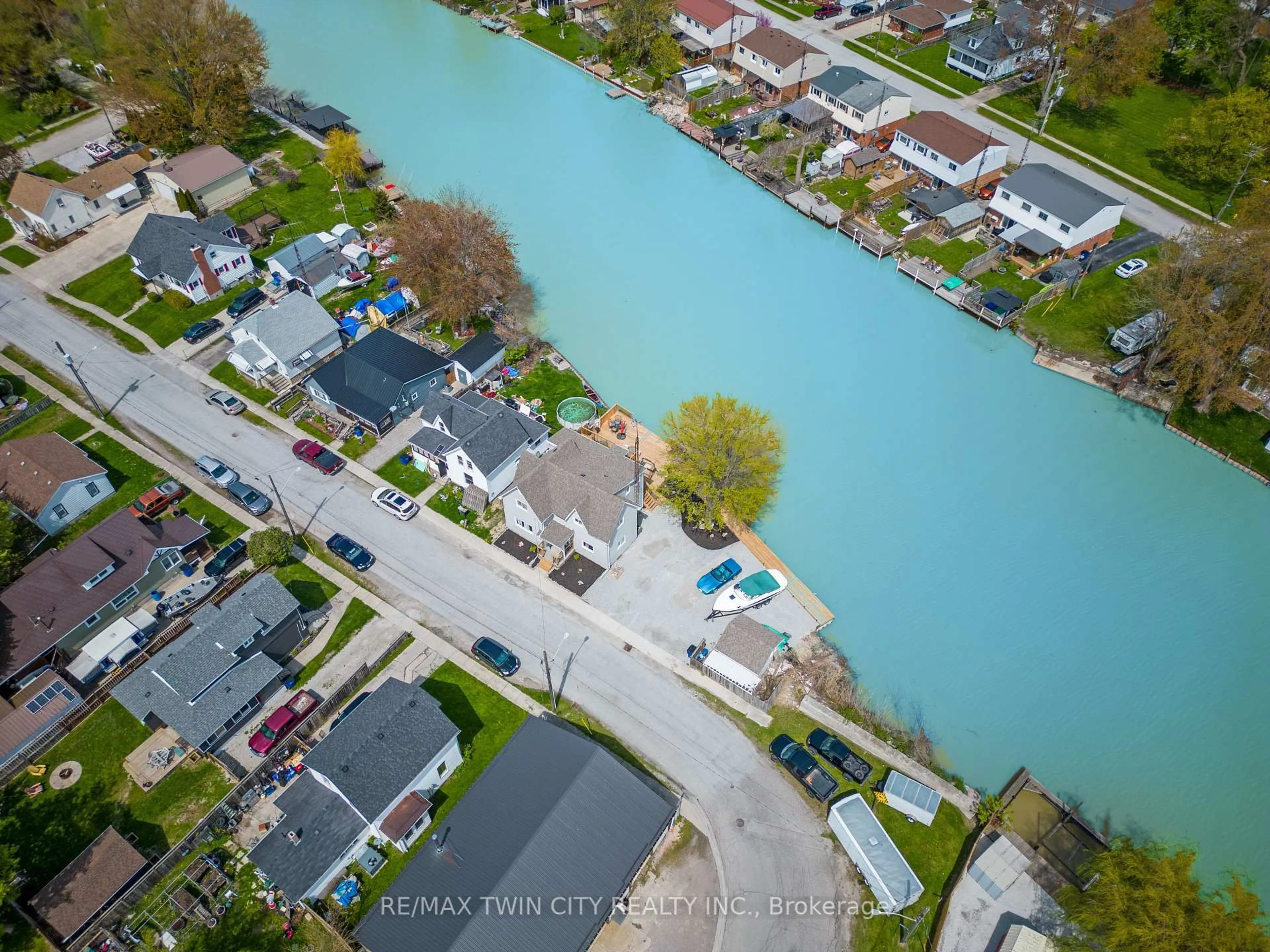 A pic from outside/outdoor area/front of a property/back of a property/a pic from drone, water/lake/river/ocean view for 310 Emily St, Chatham-Kent Ontario N8A 4K3
