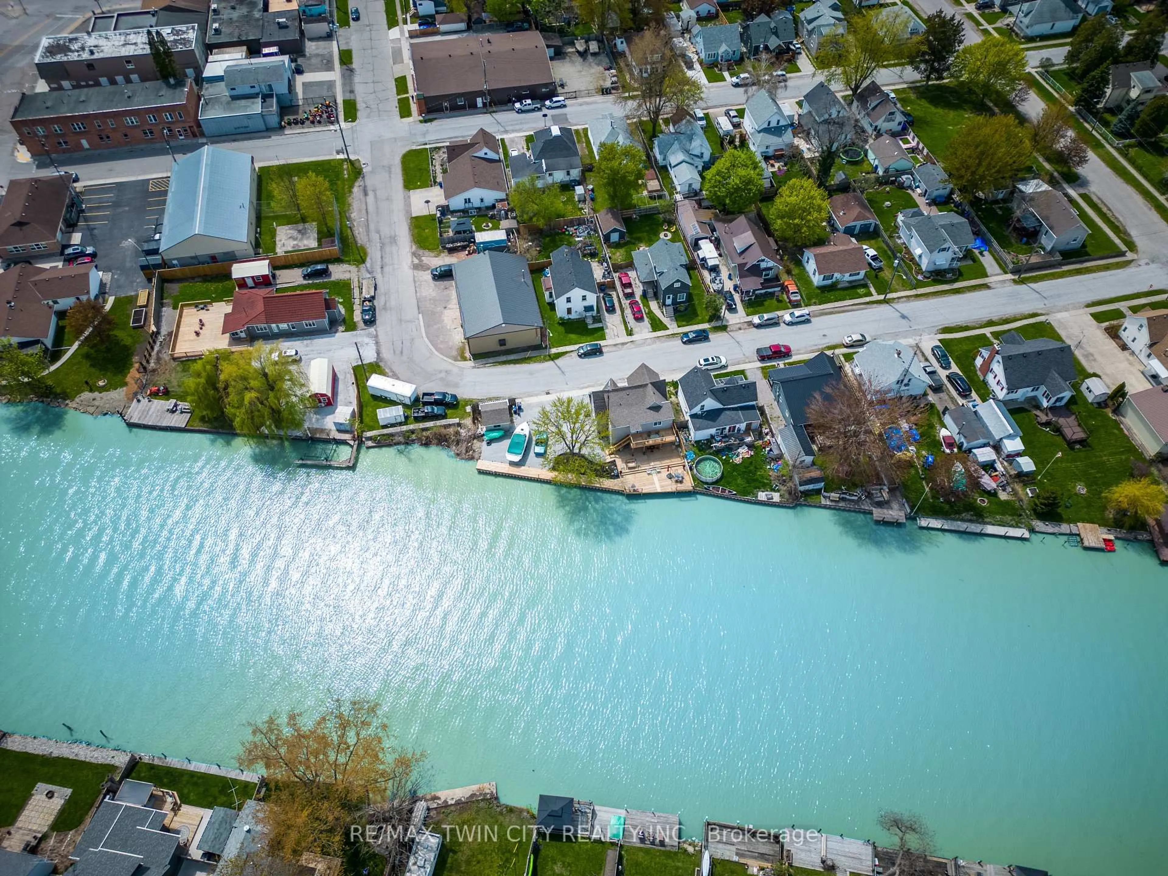 A pic from outside/outdoor area/front of a property/back of a property/a pic from drone, water/lake/river/ocean view for 310 Emily St, Chatham-Kent Ontario N8A 4K3