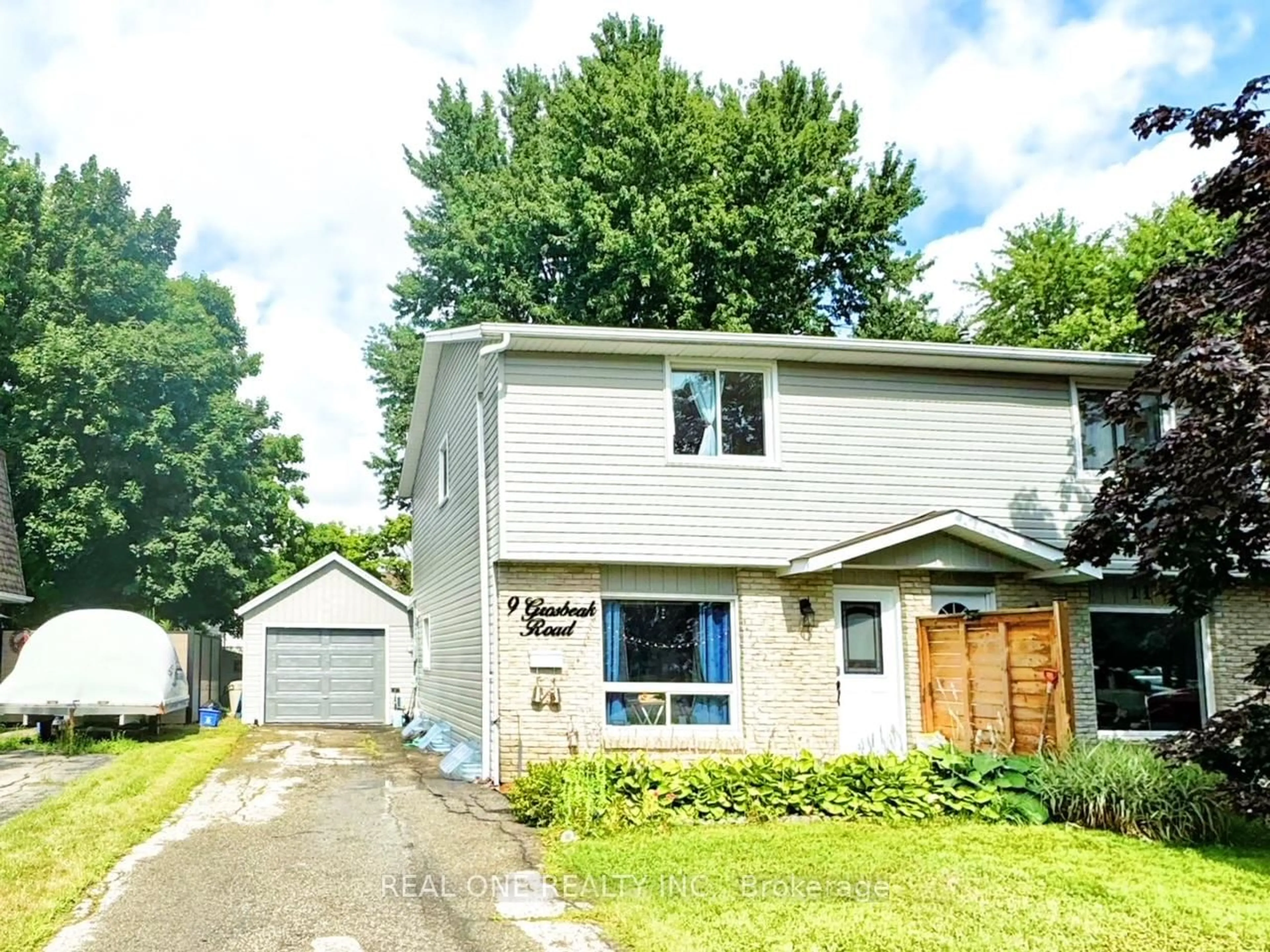 Home with vinyl exterior material, street for 9 Grosbeak Rd, Woolwich Ontario N3B 1V6