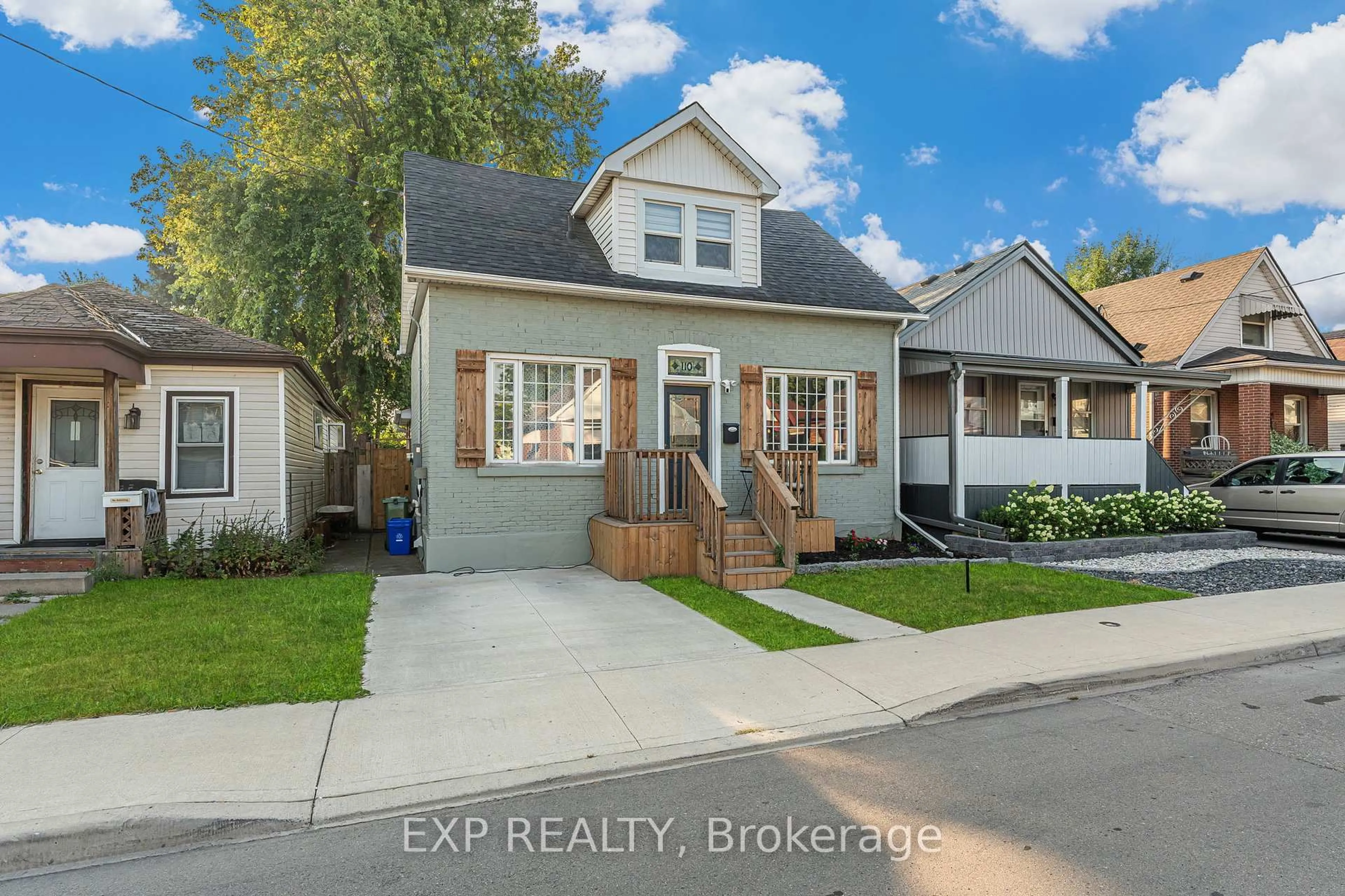 Home with vinyl exterior material, street for 110 Cameron Ave, Hamilton Ontario L8H 4Z2