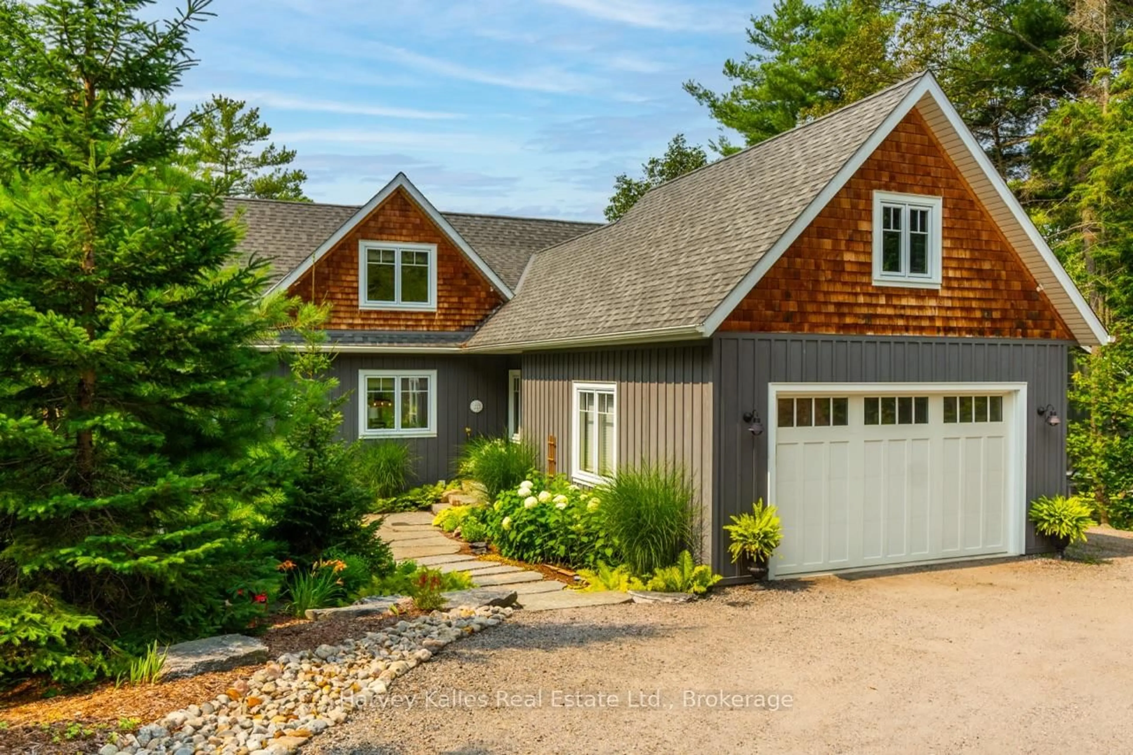 Home with vinyl exterior material, street for 2781 Muskoka Road 118 West, Muskoka Lakes Ontario P0B 1J0