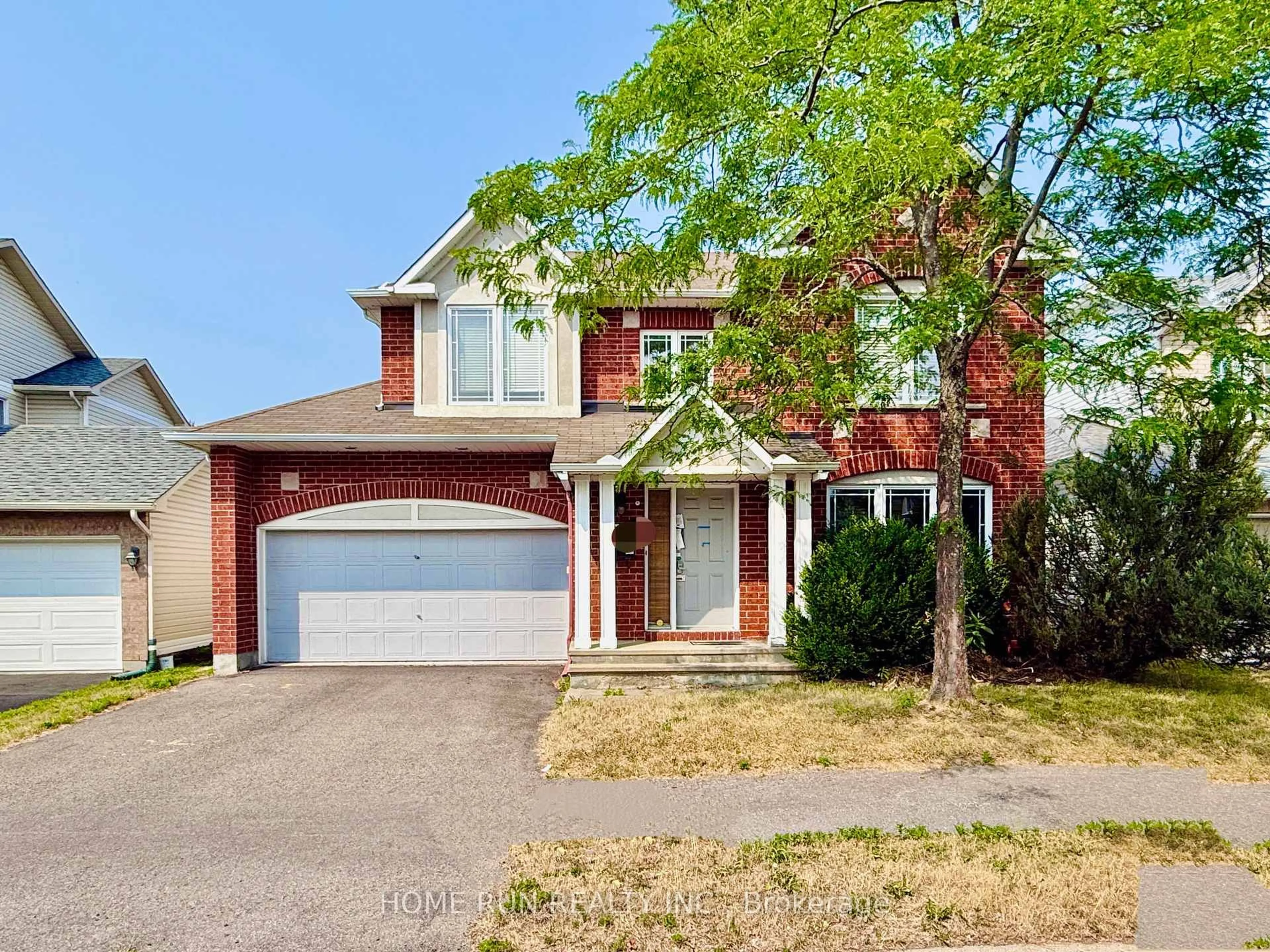 Home with brick exterior material, street for 945 Cahill Dr, Ottawa Ontario K1V 2C3