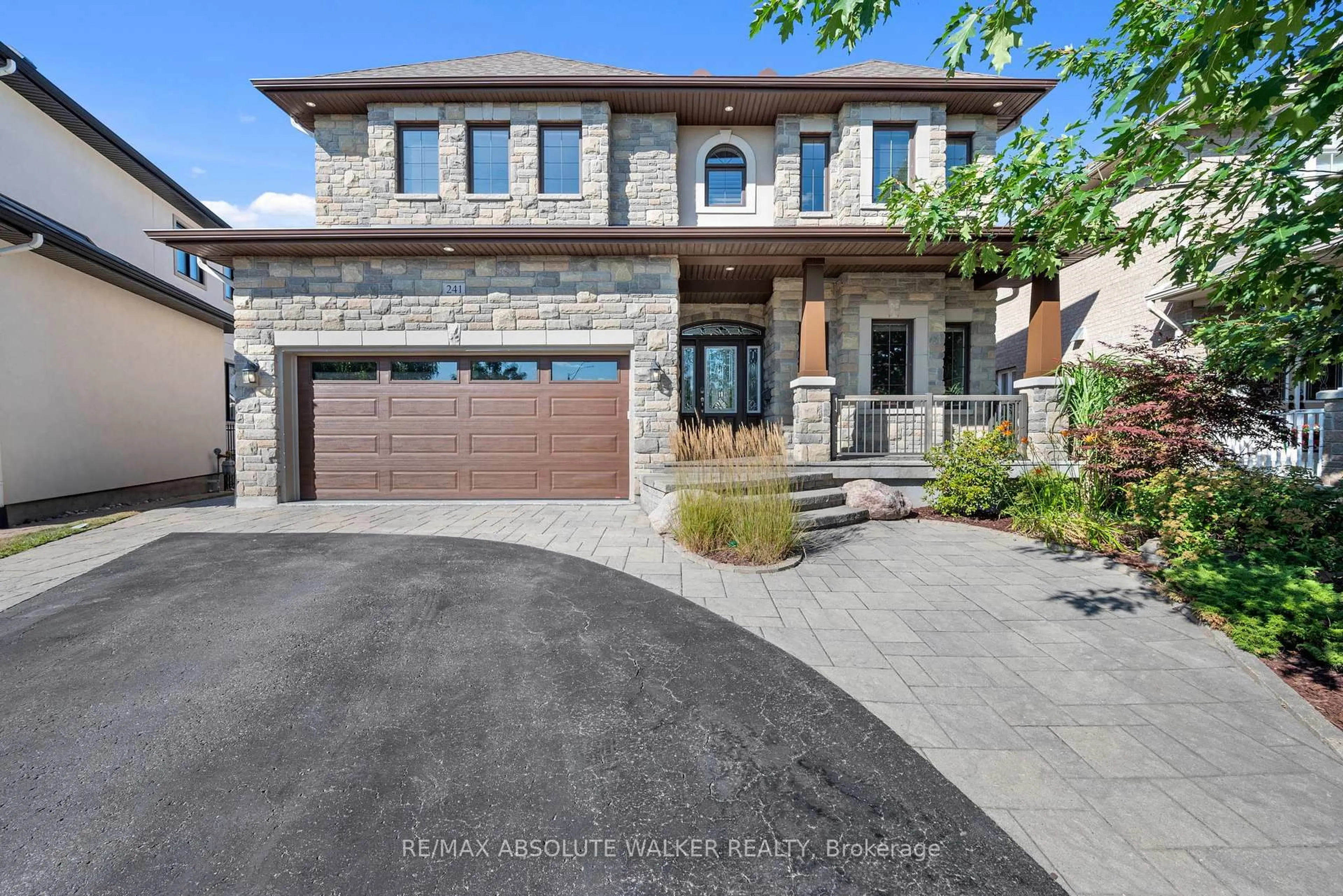Home with brick exterior material, street for 241 Madhu Cres, Ottawa Ontario K2C 4J2