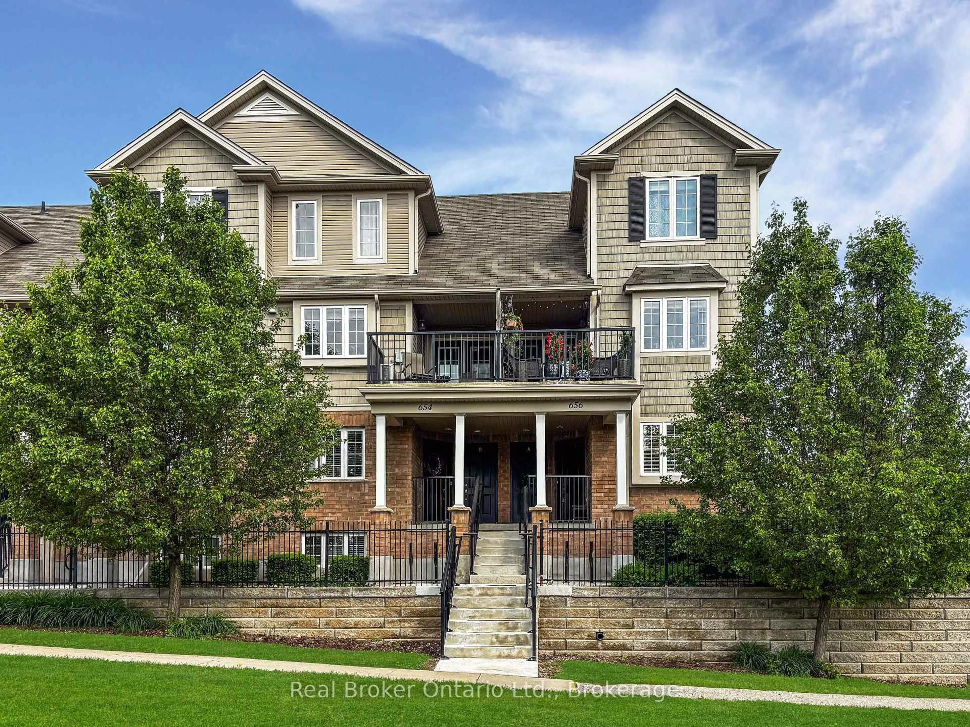 Home with brick exterior material, street for 656 Woodlawn Rd #656B, Guelph Ontario N1E 0K4