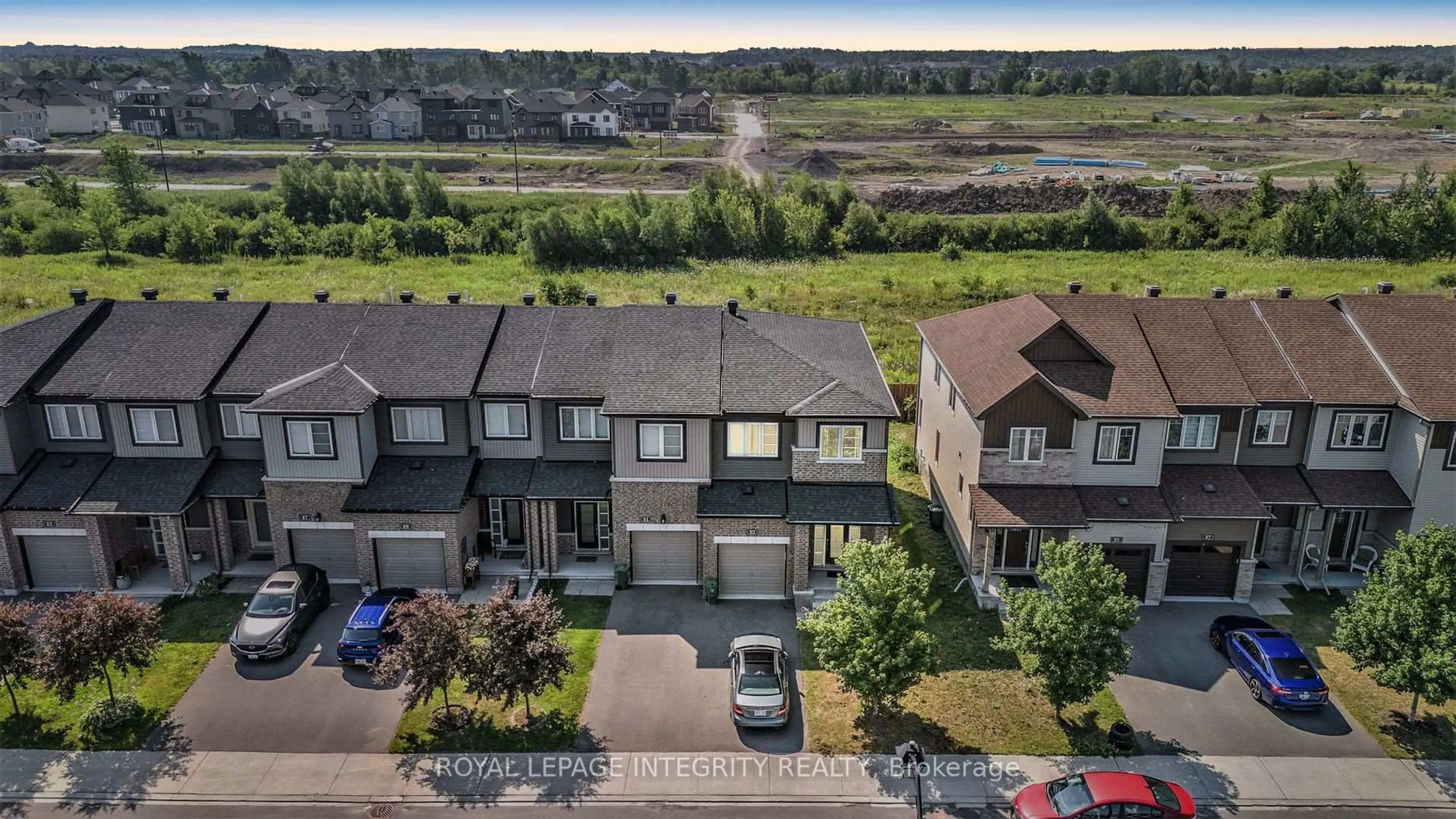 A pic from outside/outdoor area/front of a property/back of a property/a pic from drone, water/lake/river/ocean view for 93 Aura Ave, Ottawa Ontario K2J 6R8