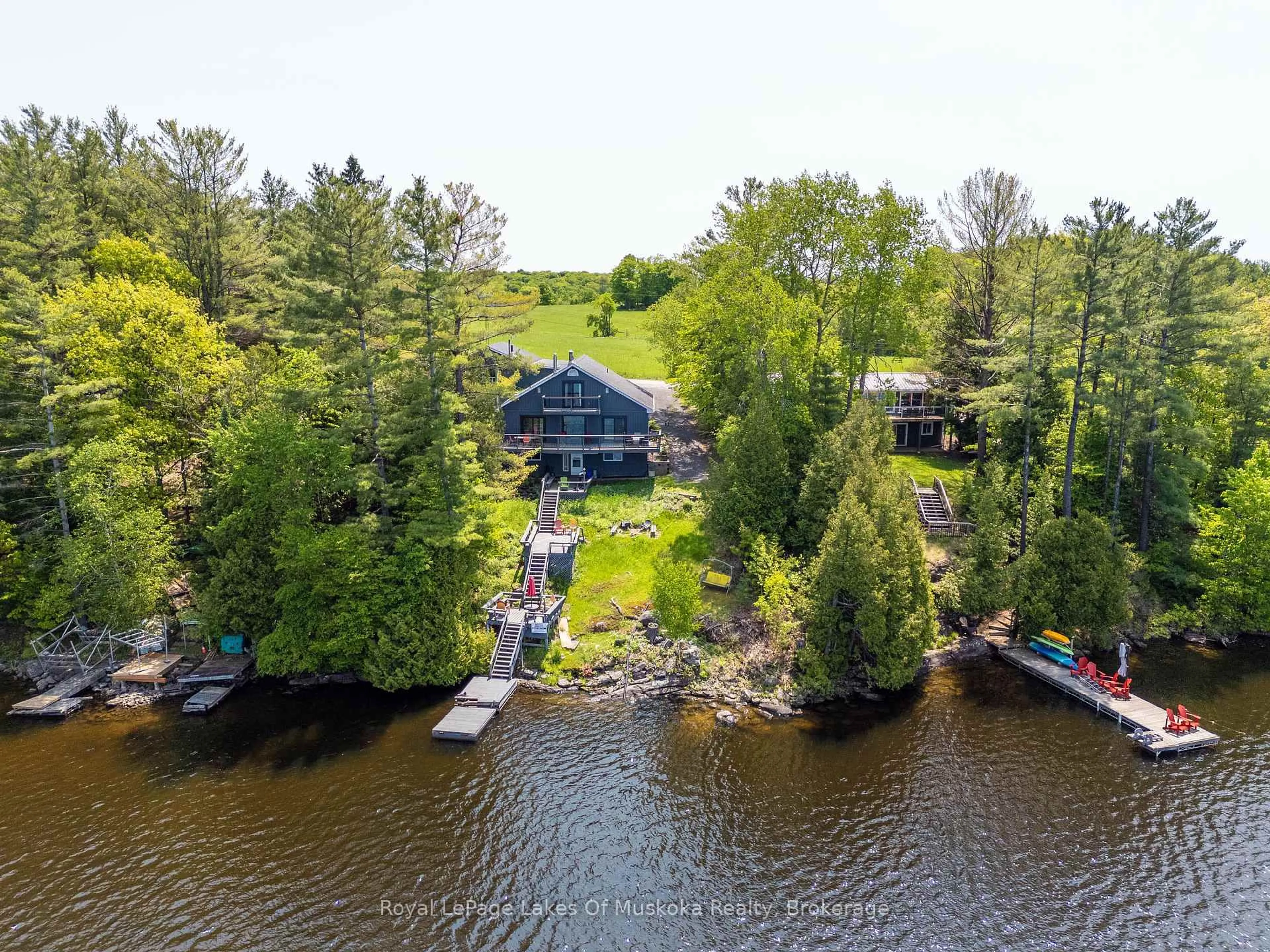 A pic from outside/outdoor area/front of a property/back of a property/a pic from drone, water/lake/river/ocean view for 1378 Three Mile Lake Rd #3, Muskoka Lakes Ontario P0B 1M0